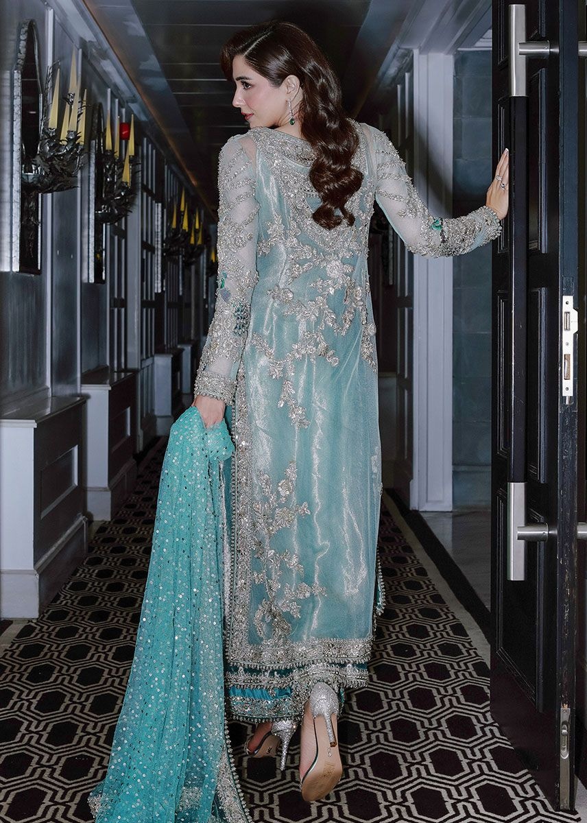 Ferozeah pakistani fashion outfit with coordinated formal styling.