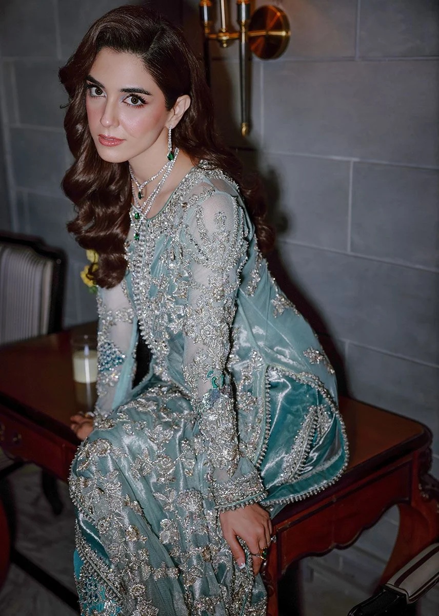 Ferozeah pakistani fashion outfit with coordinated formal styling.