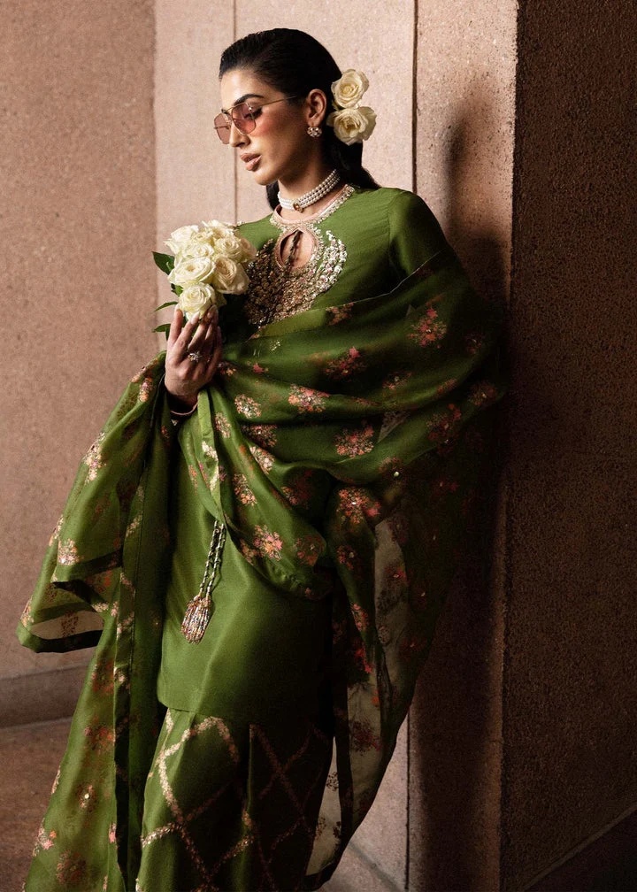 Green-Merlot pakistani fashion outfit in gold, pink, green tones.