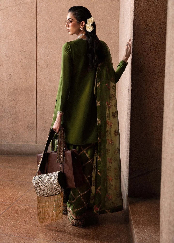 Green-Merlot pakistani fashion outfit in gold, pink, green tones.