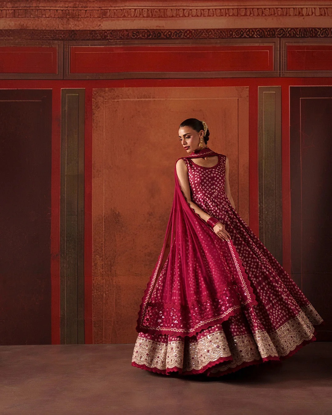 Gulinar Pakistani fashion outfit in wine tones.