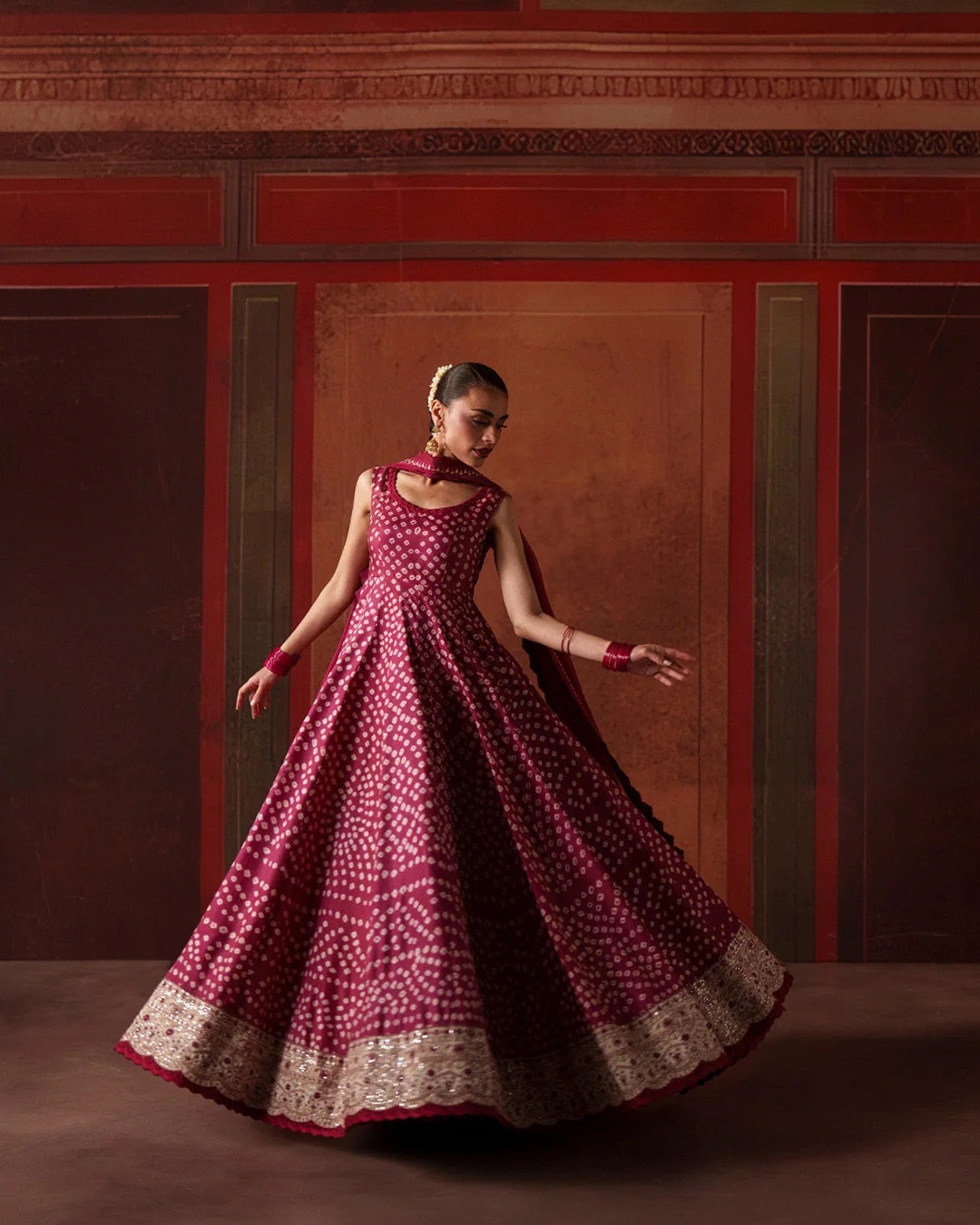 Gulinar Pakistani fashion outfit in wine tones.