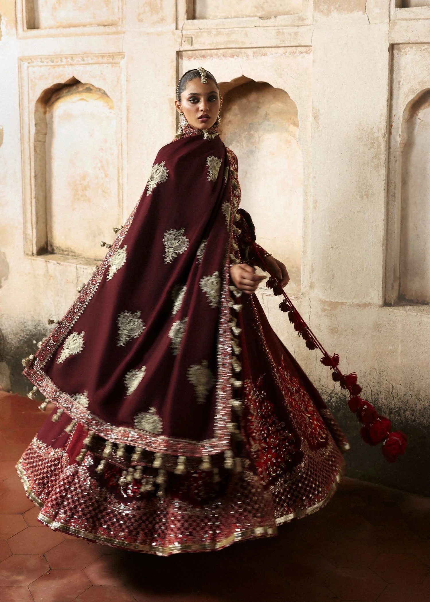 Gulnar Pakistani fashion outfit in maroon, burgundy tones.