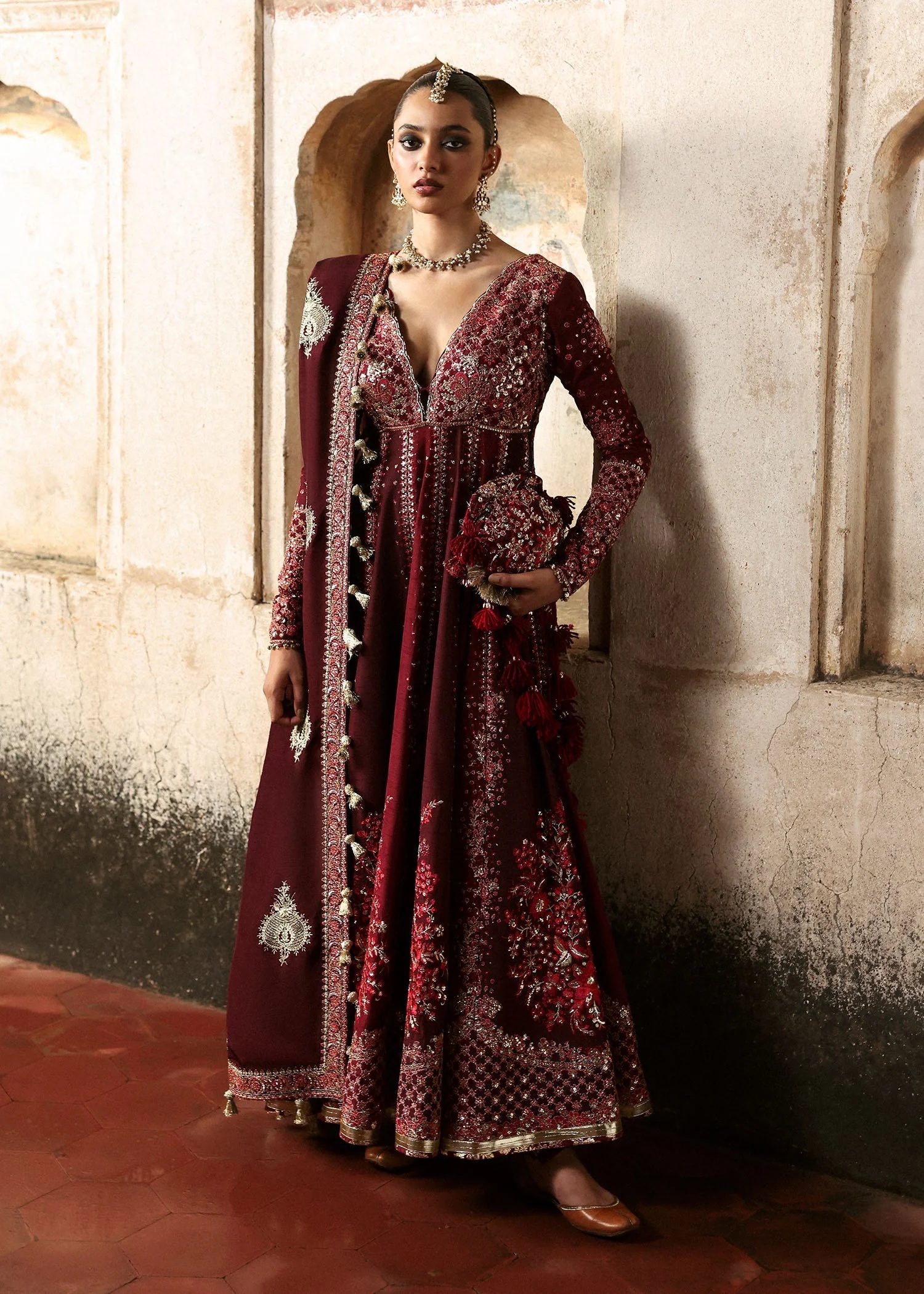 Gulnar Pakistani fashion outfit in maroon, burgundy tones.
