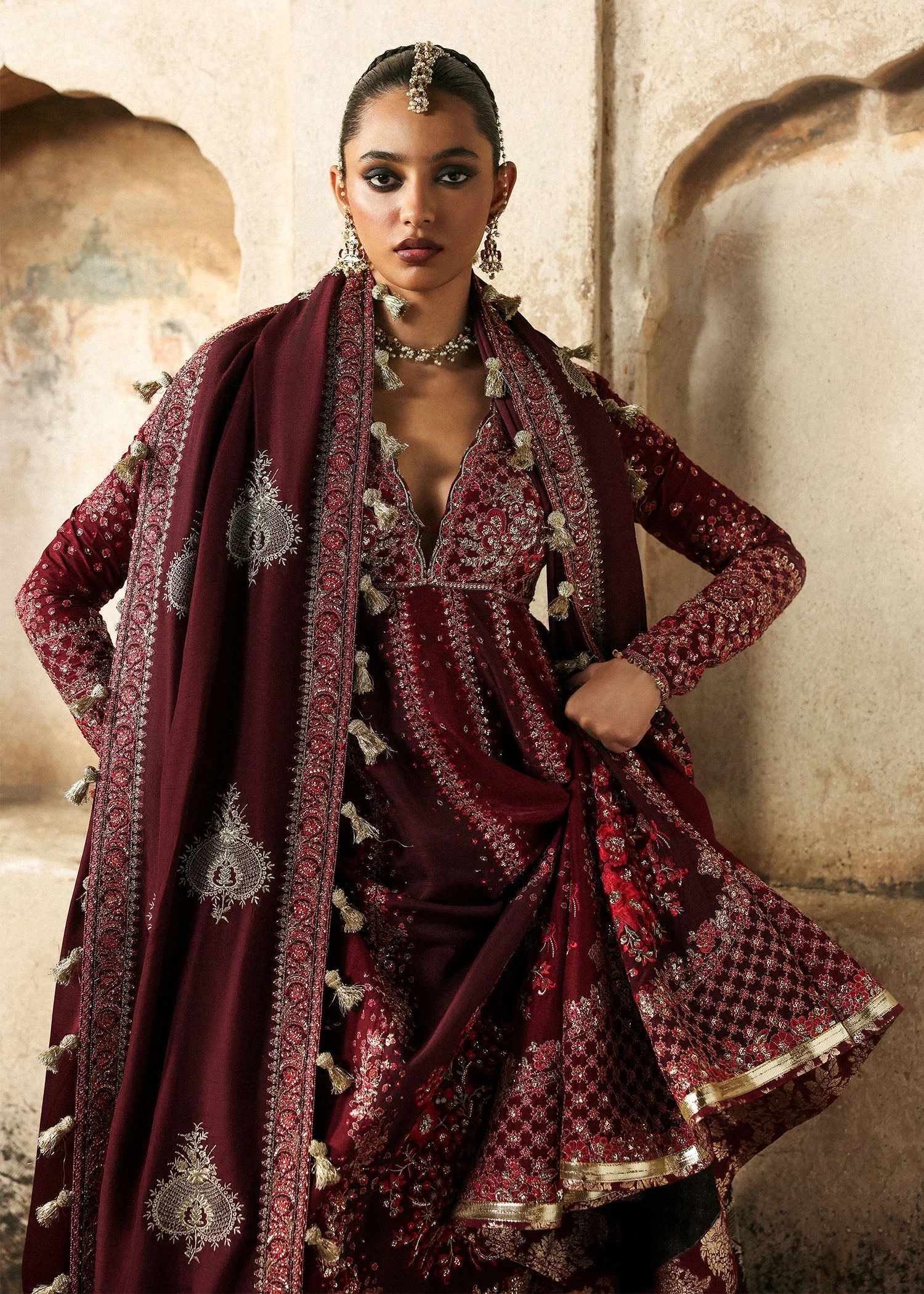 Gulnar Pakistani fashion outfit in maroon, burgundy tones.