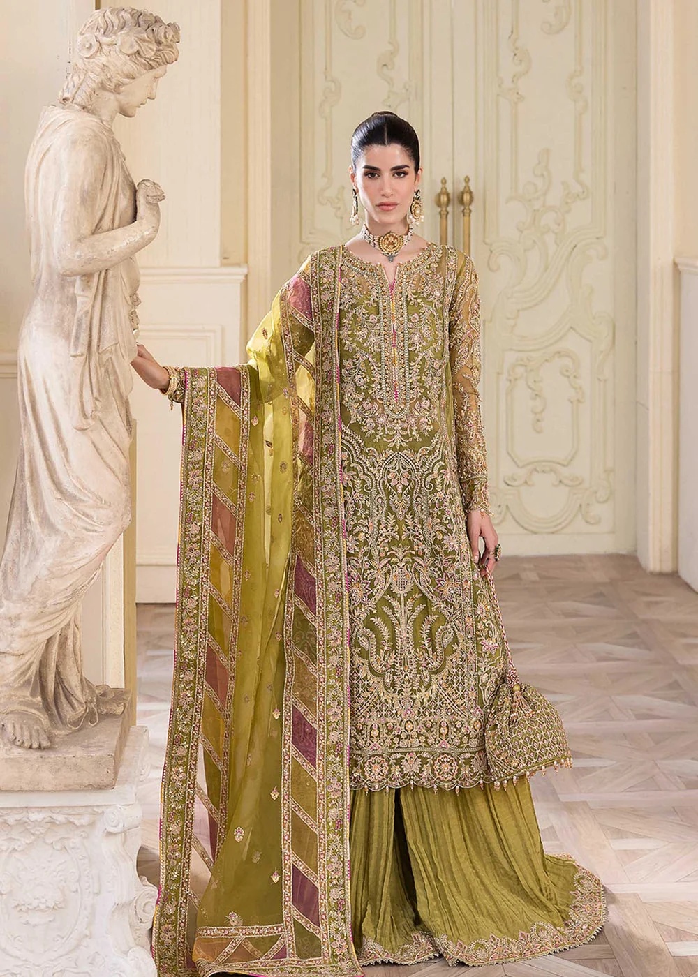 Halena pakistani fashion outfit with coordinated formal styling.