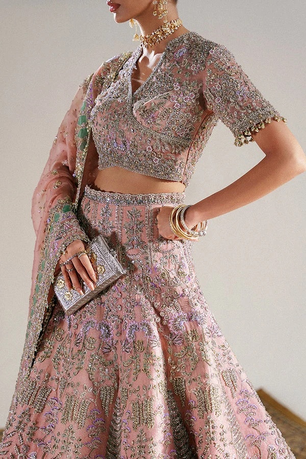 Haneira pakistani fashion outfit in pink, silver tones.