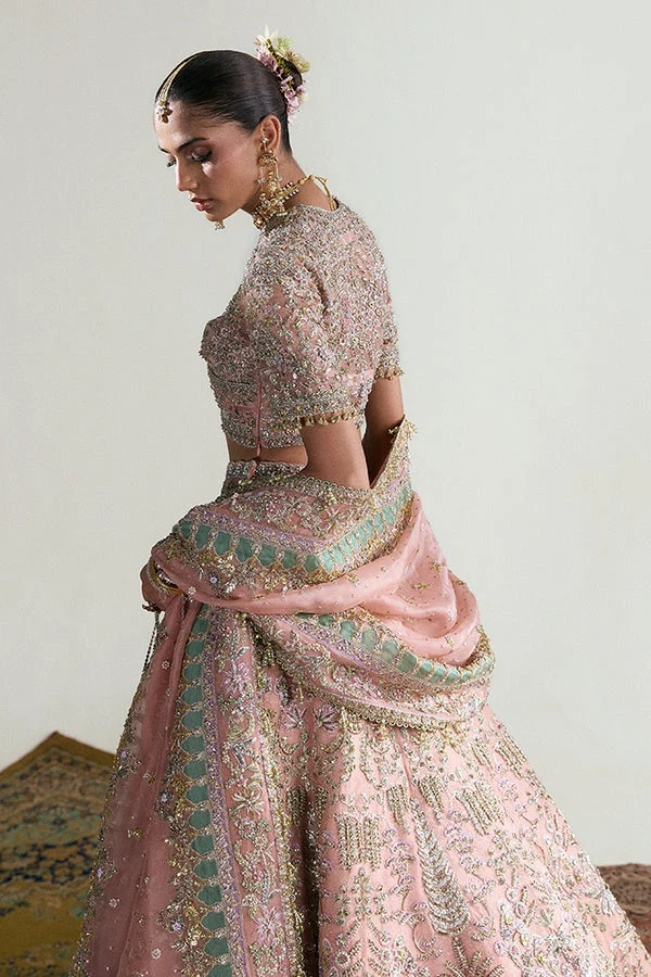 Haneira pakistani fashion outfit in pink, silver tones.