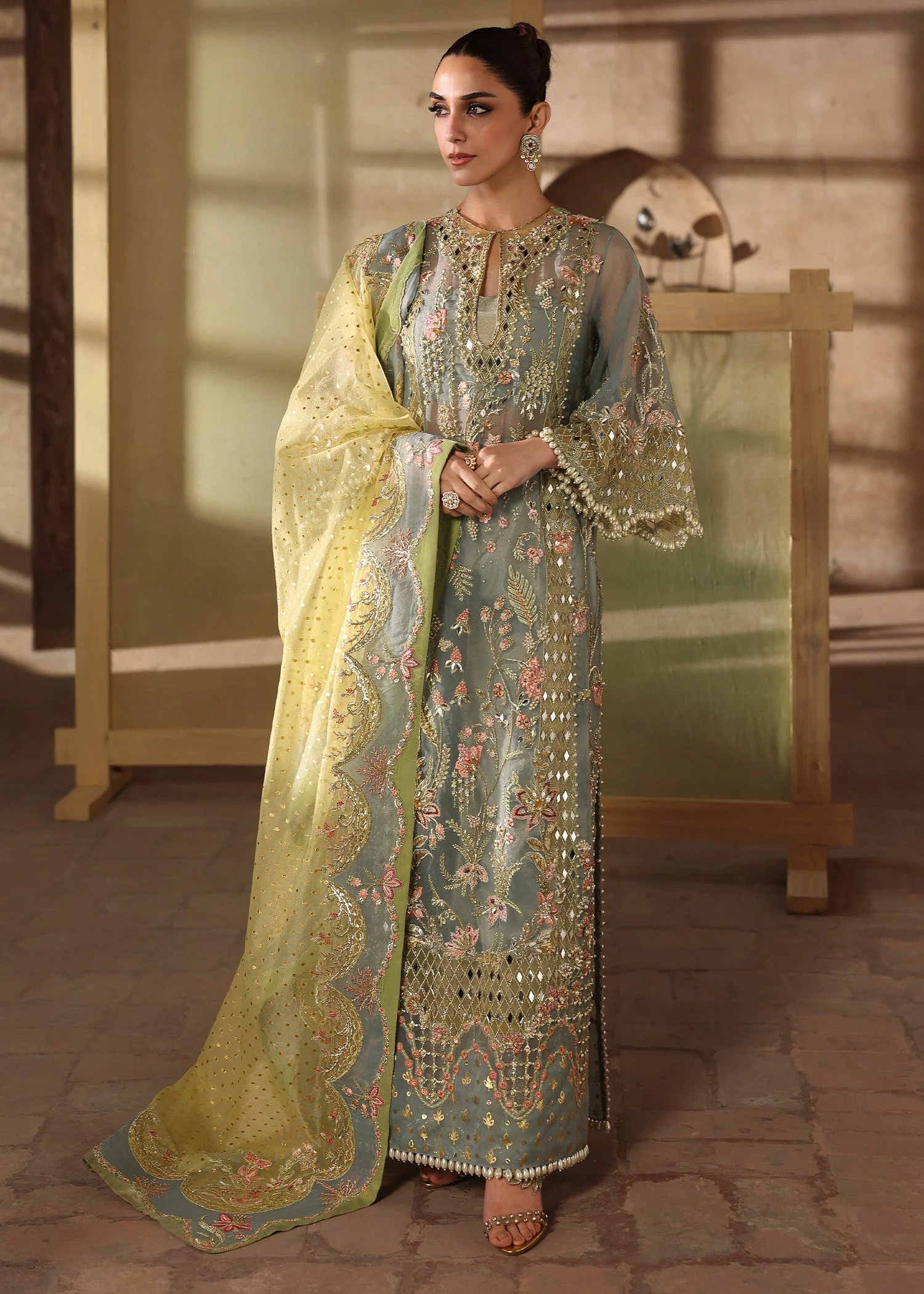 JHALAK Pakistani fashion outfit in blue, yellow tones.