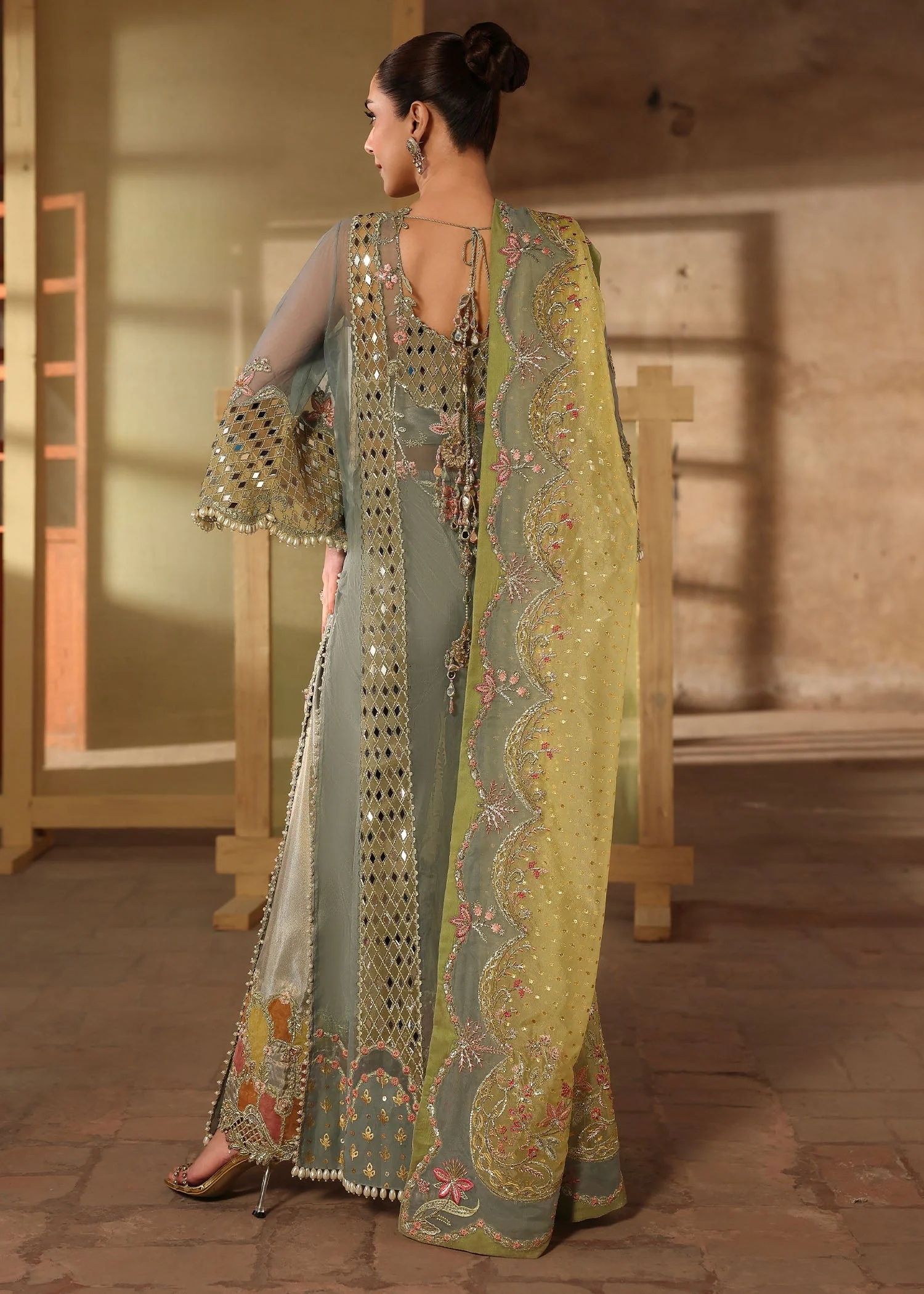 JHALAK Pakistani fashion outfit in blue, yellow tones.
