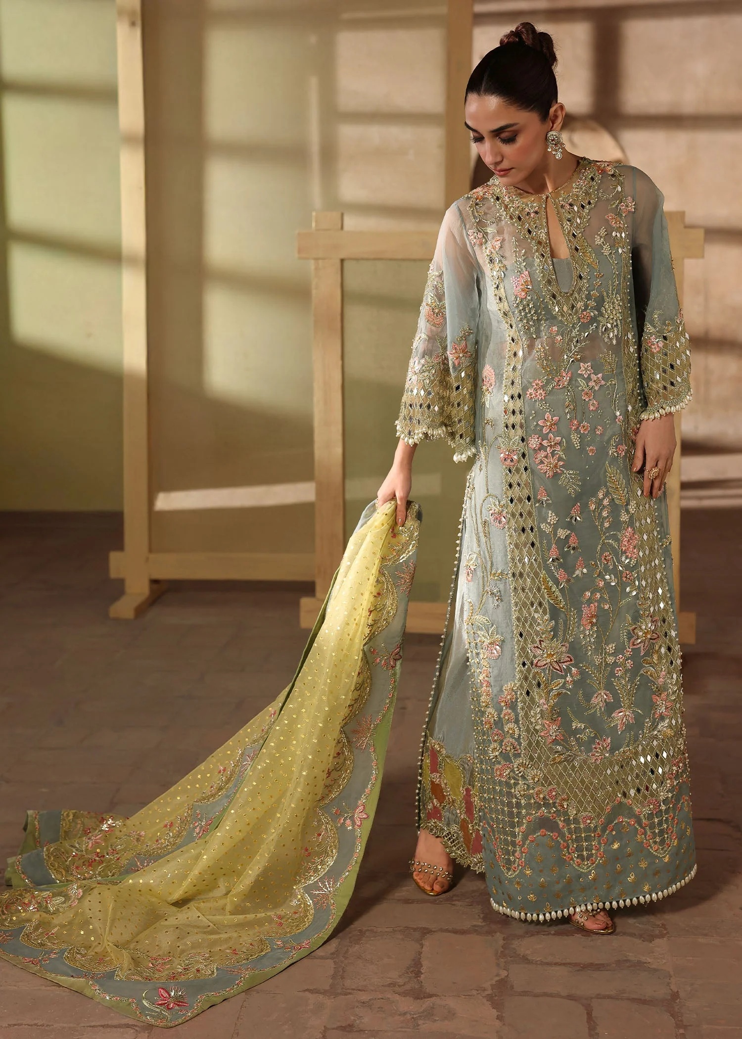 JHALAK Pakistani fashion outfit in blue, yellow tones.