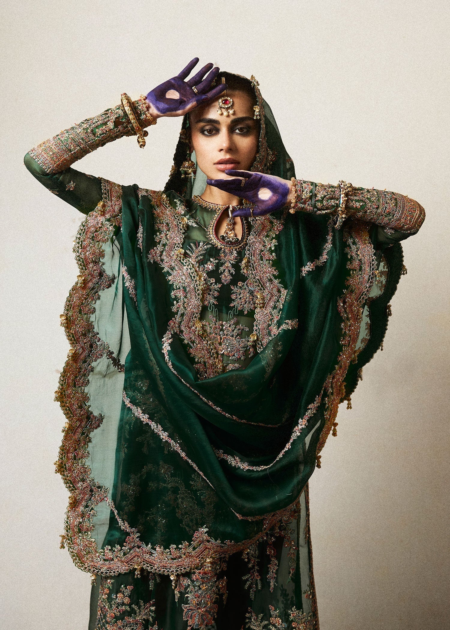 Jamali pakistani fashion outfit in maroon tones.