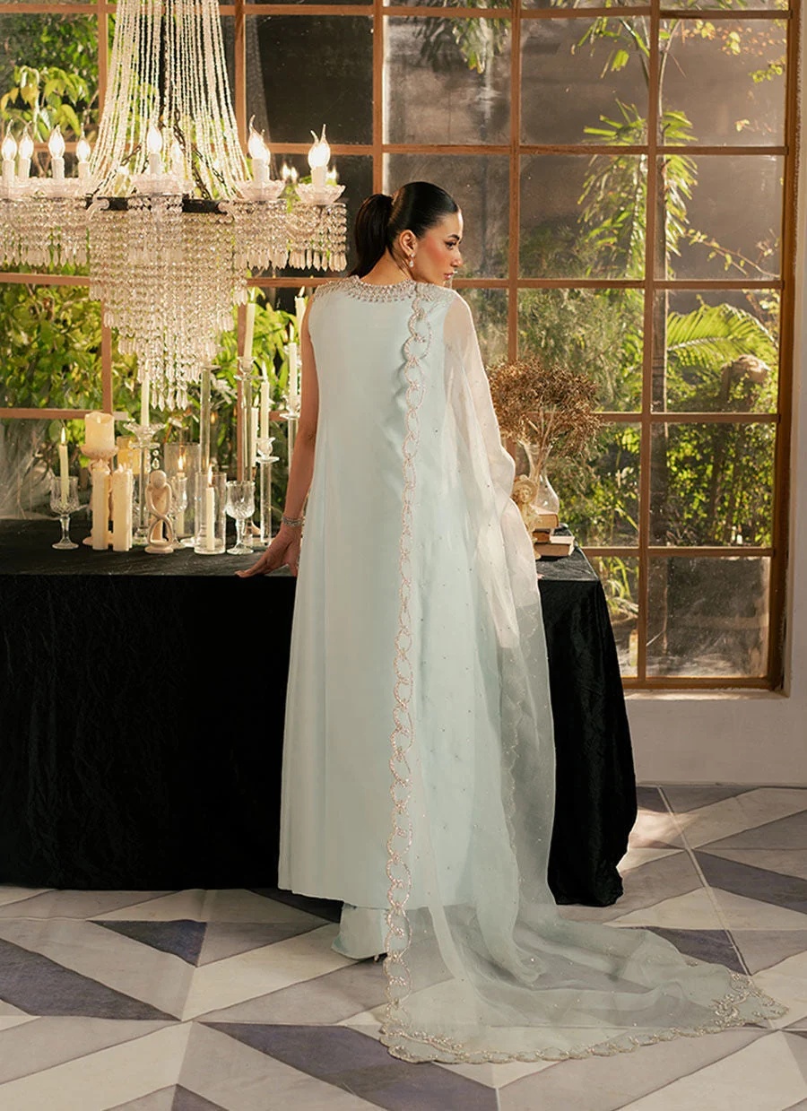 KHAKHA pakistani fashion outfit with coordinated formal styling.