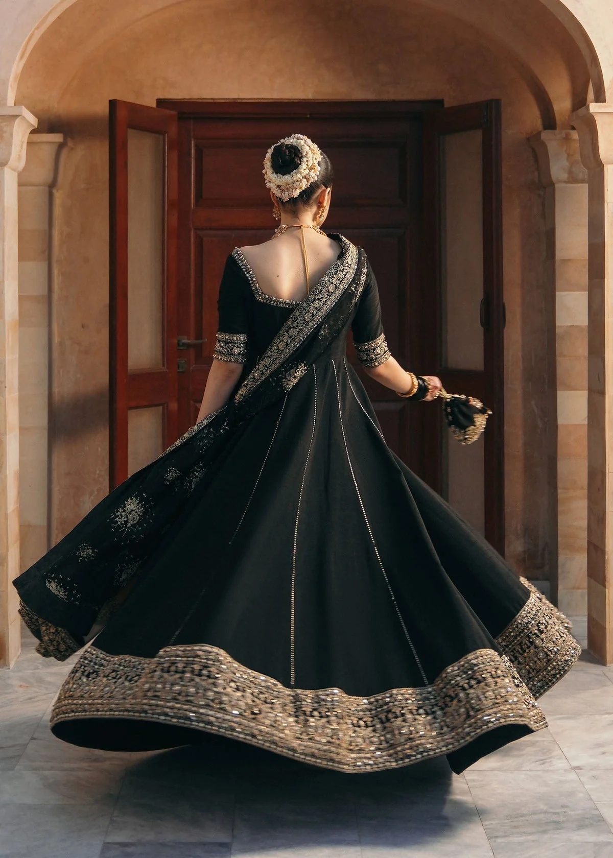 Kajal Pakistani fashion outfit in black tones.