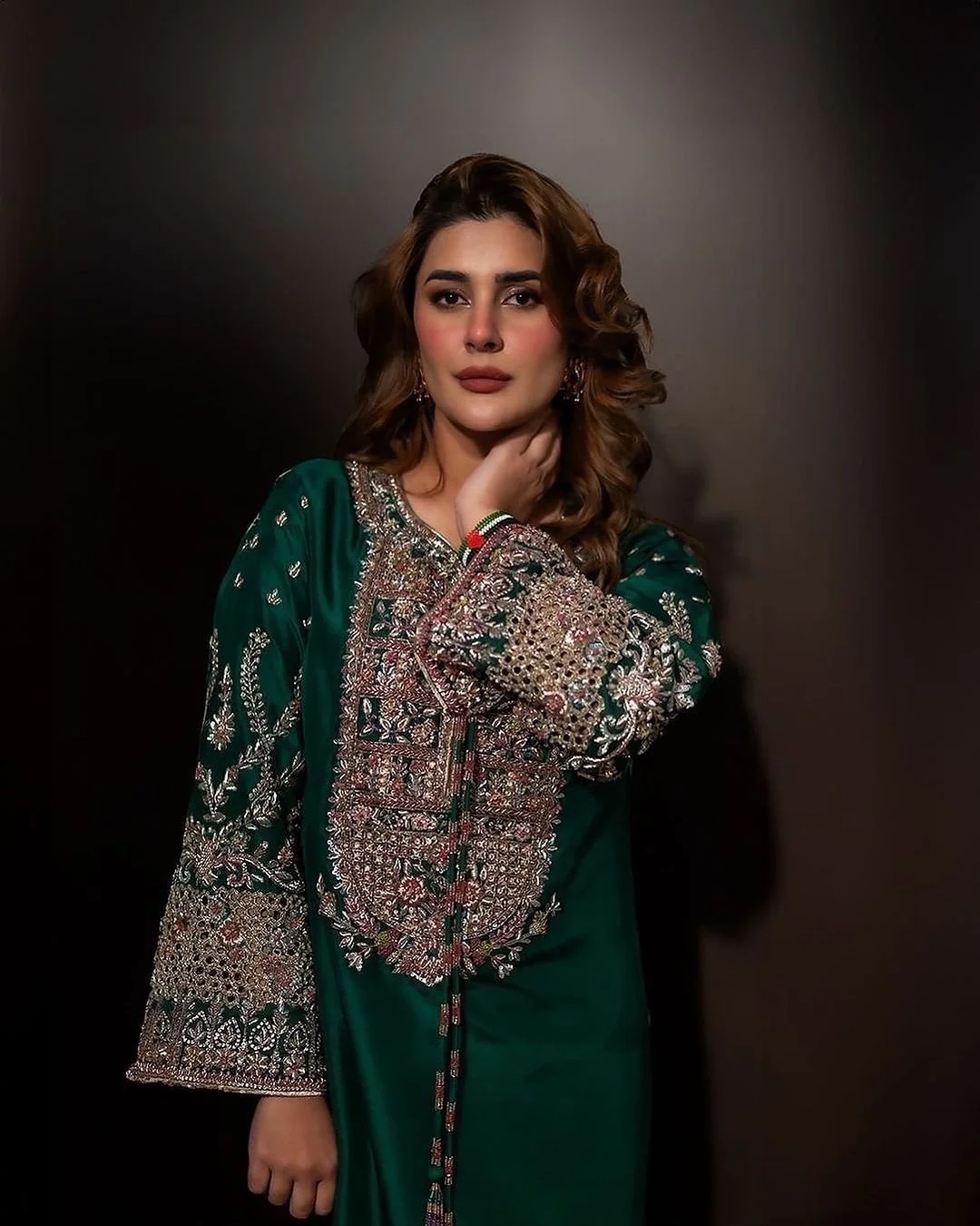 Kubra pakistani fashion outfit with coordinated formal styling.