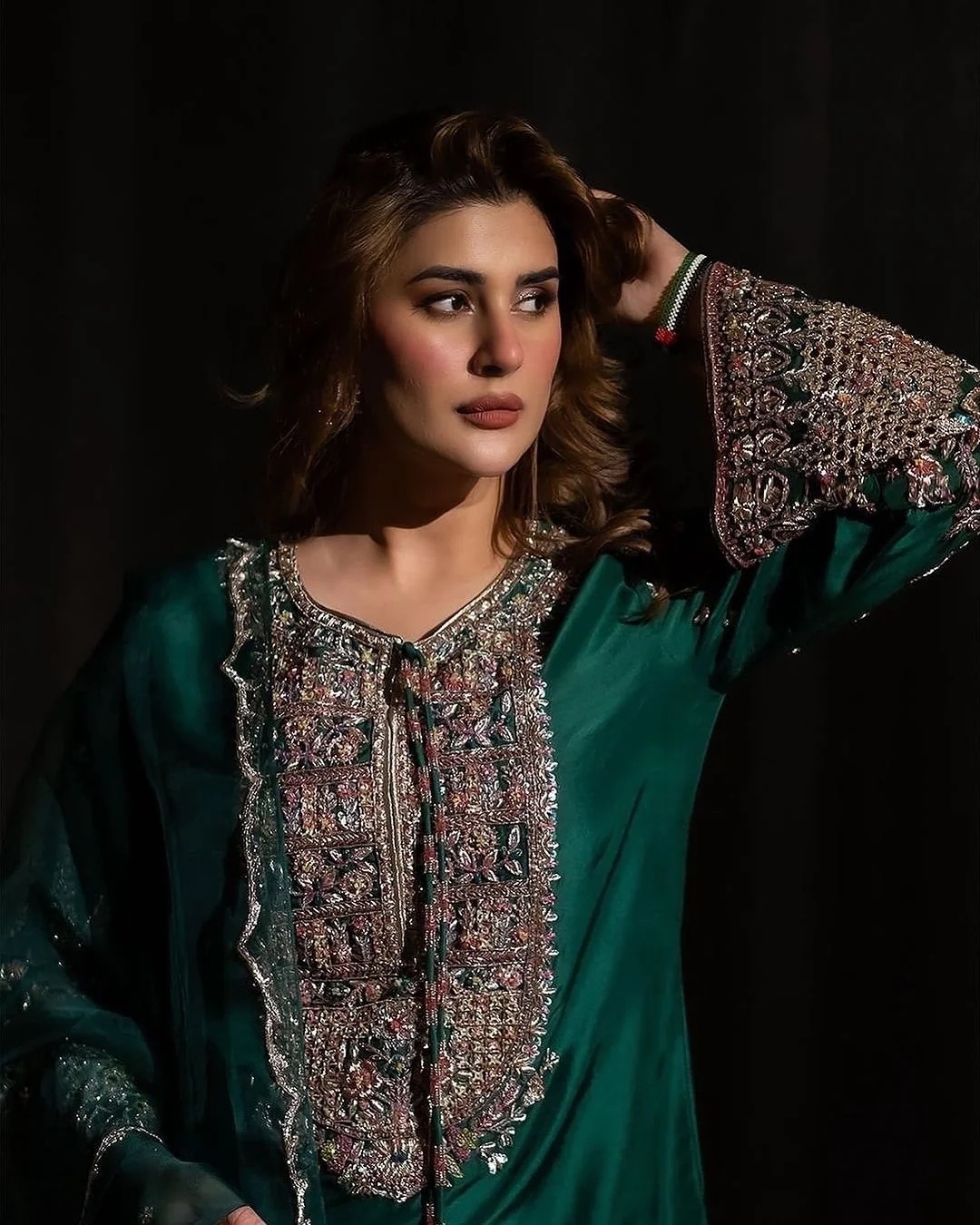 Kubra pakistani fashion outfit with coordinated formal styling.