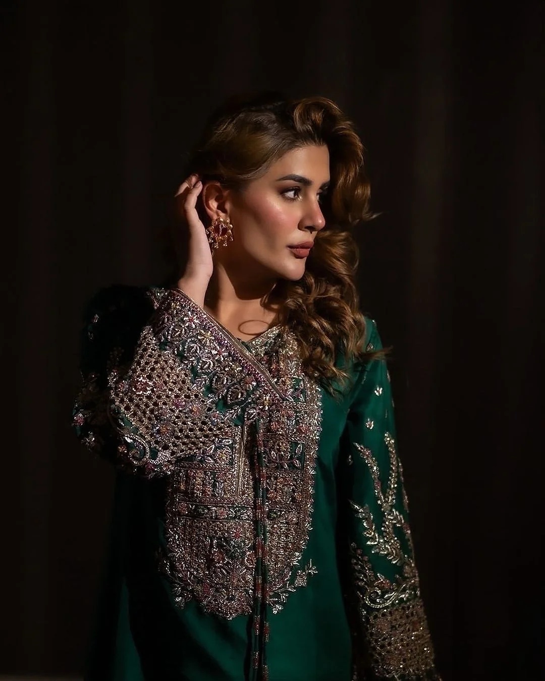 Kubra pakistani fashion outfit with coordinated formal styling.