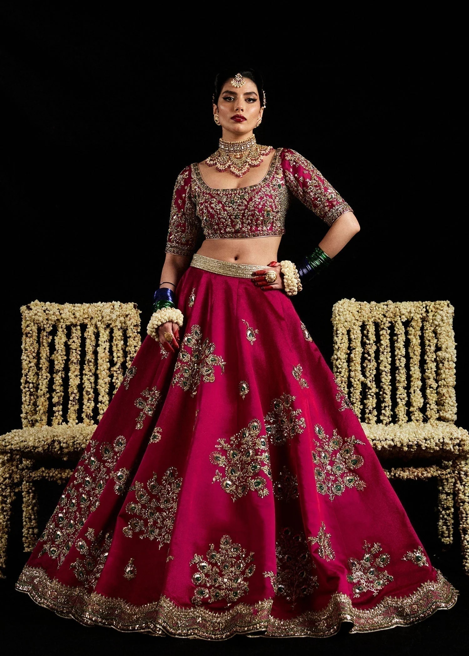 Laal pakistani fashion outfit in pink tones.
