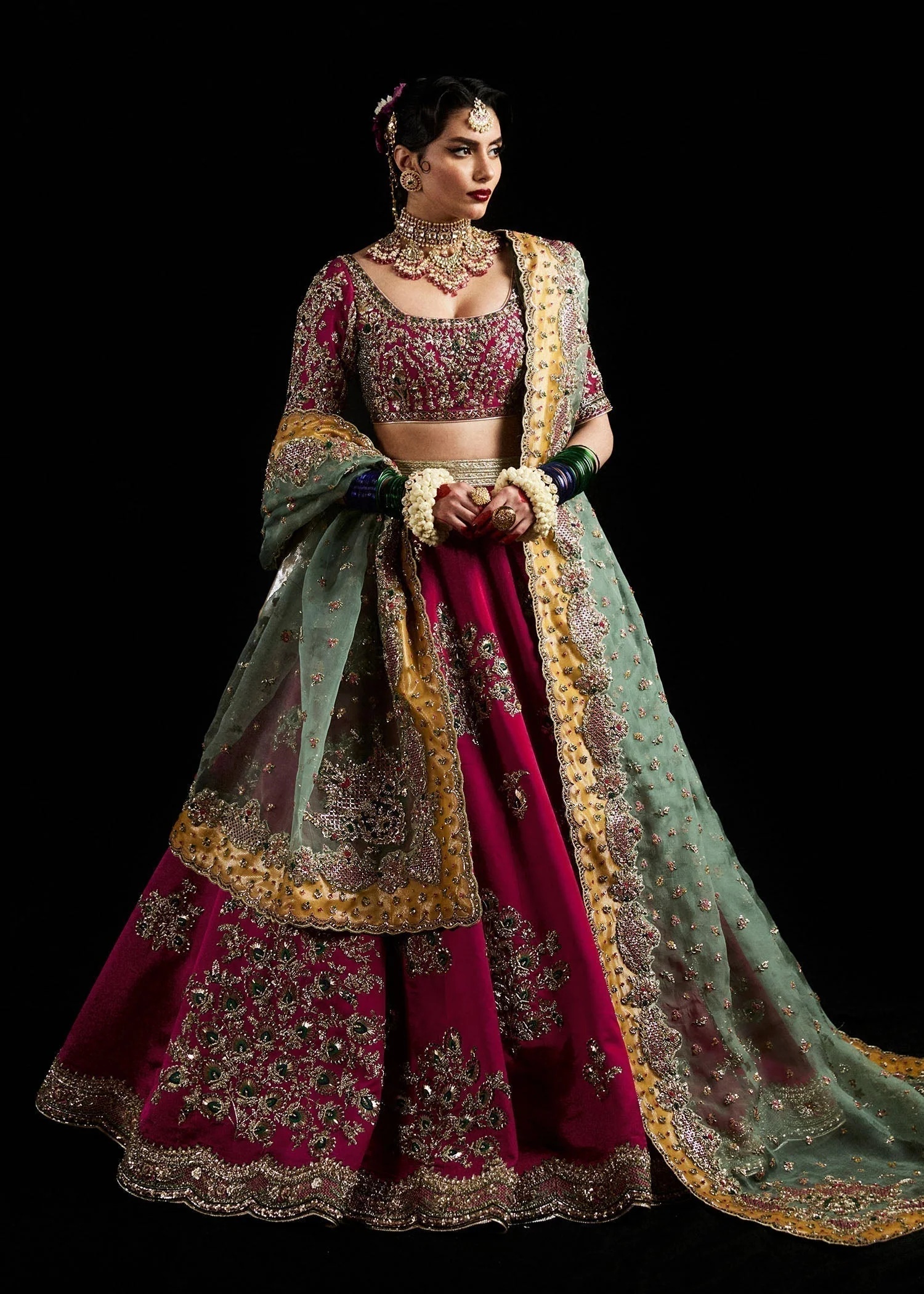 Laal pakistani fashion outfit in pink tones.
