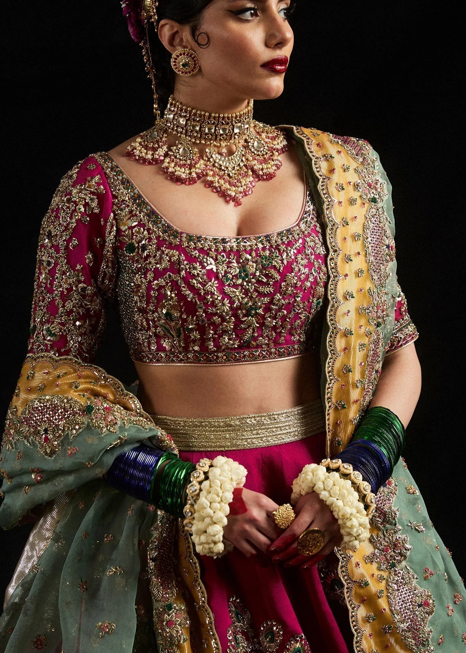 Laal pakistani fashion outfit in pink tones.