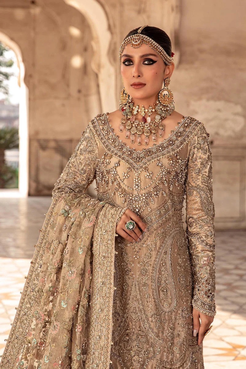 Liliana pakistani fashion outfit in gold tones.