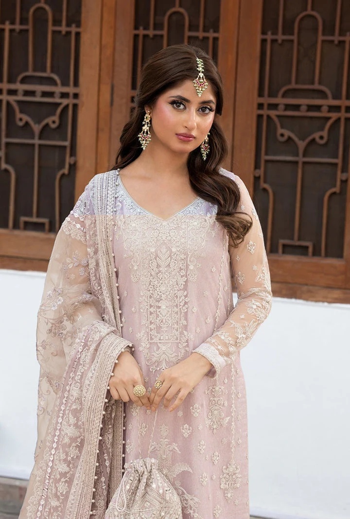 Liyan pakistani fashion outfit with coordinated formal styling.