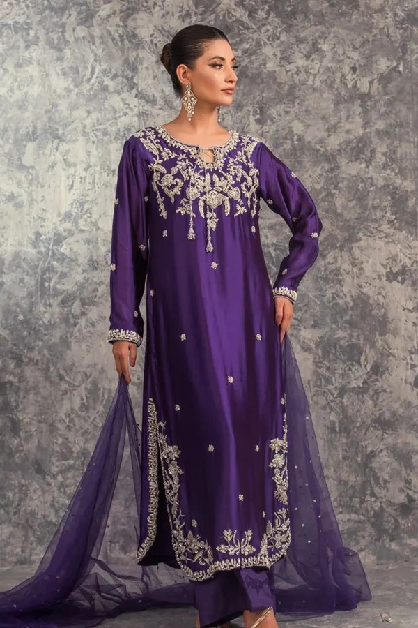 MIRAL pakistani fashion outfit with coordinated formal styling.