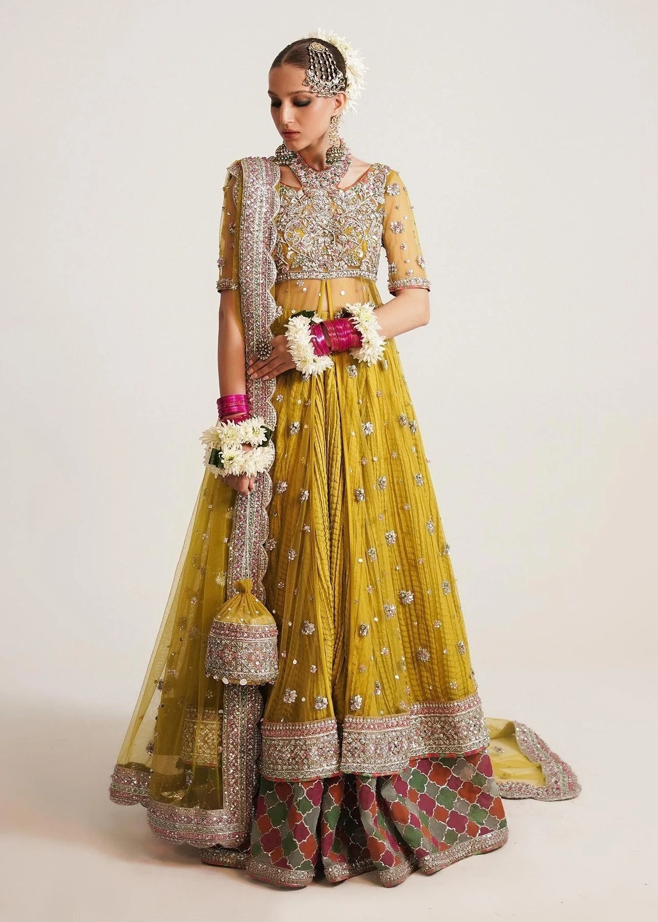 MOORE pakistani fashion outfit in yellow tones.