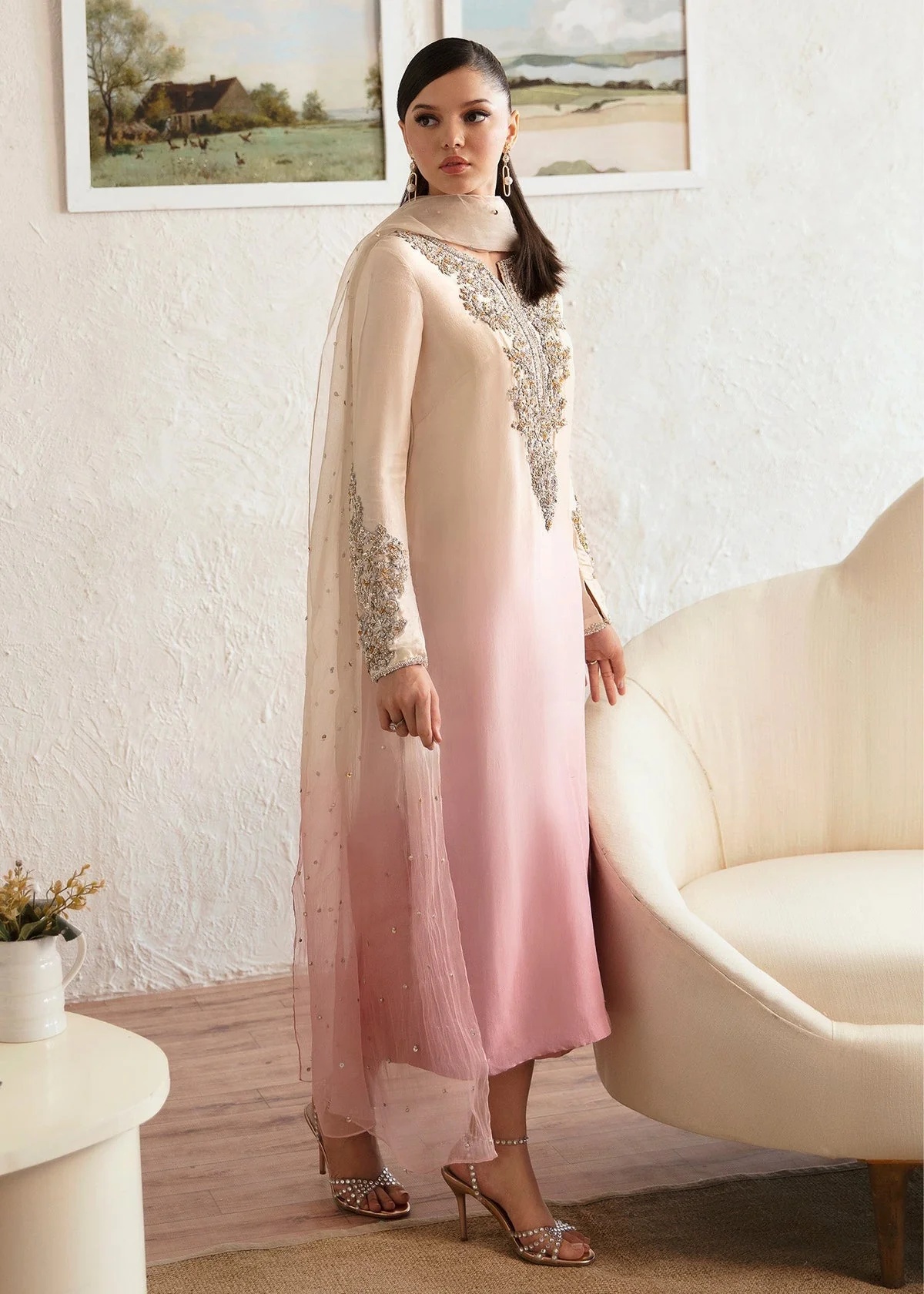 Maura Pakistani fashion outfit in pink tones.