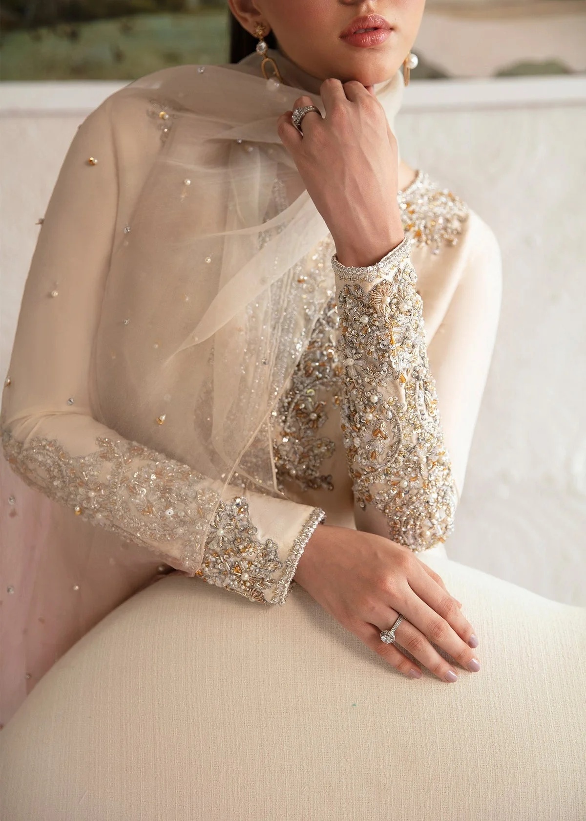 Maura Pakistani fashion outfit in pink tones.