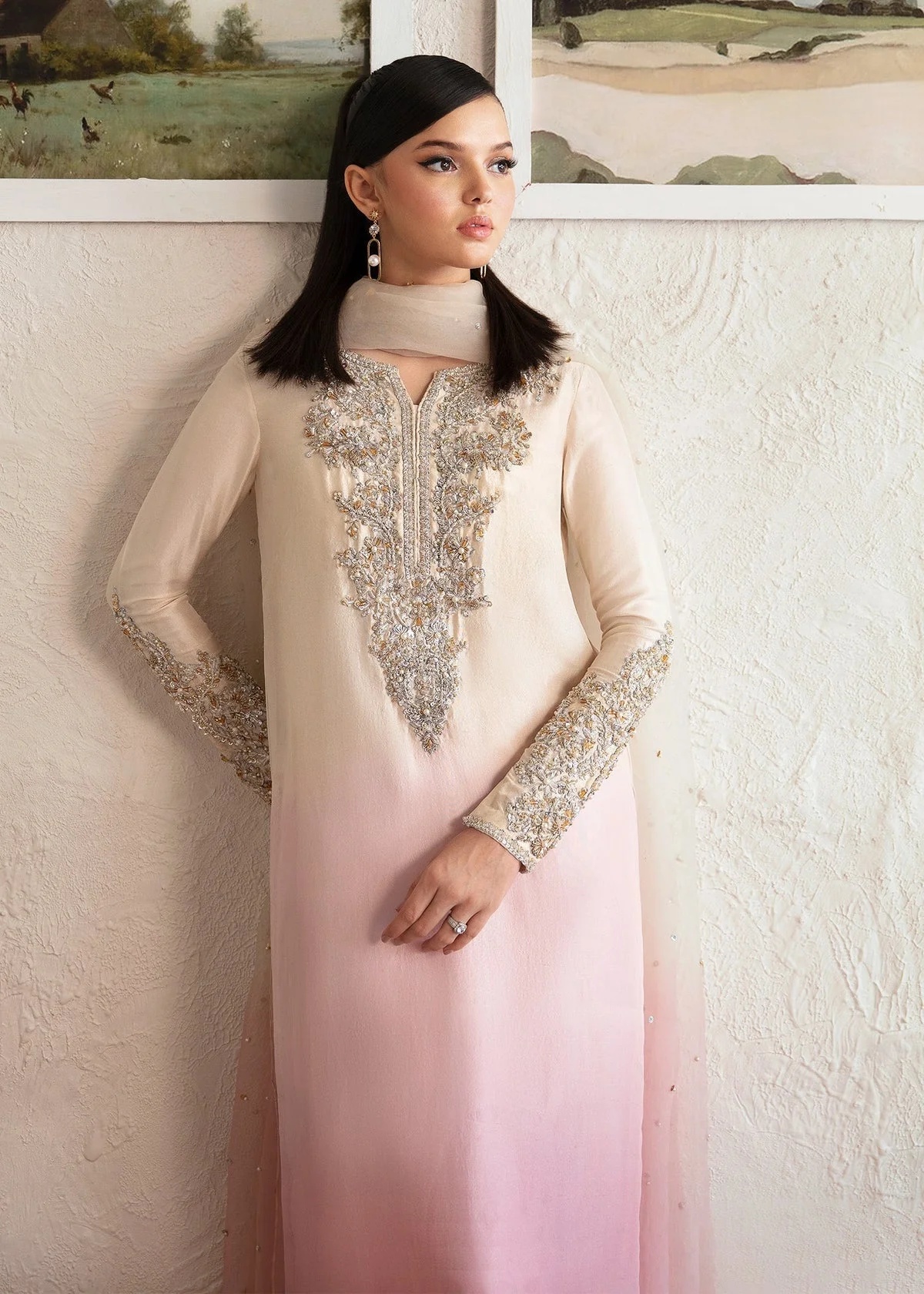 Maura Pakistani fashion outfit in pink tones.
