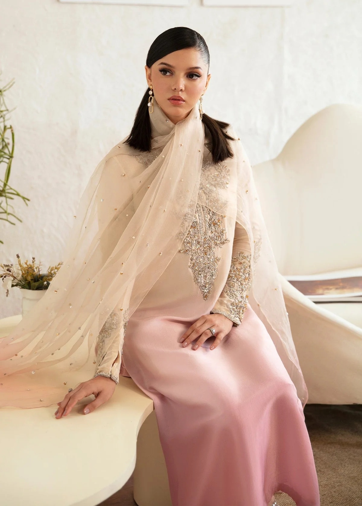 Maura Pakistani fashion outfit in pink tones.