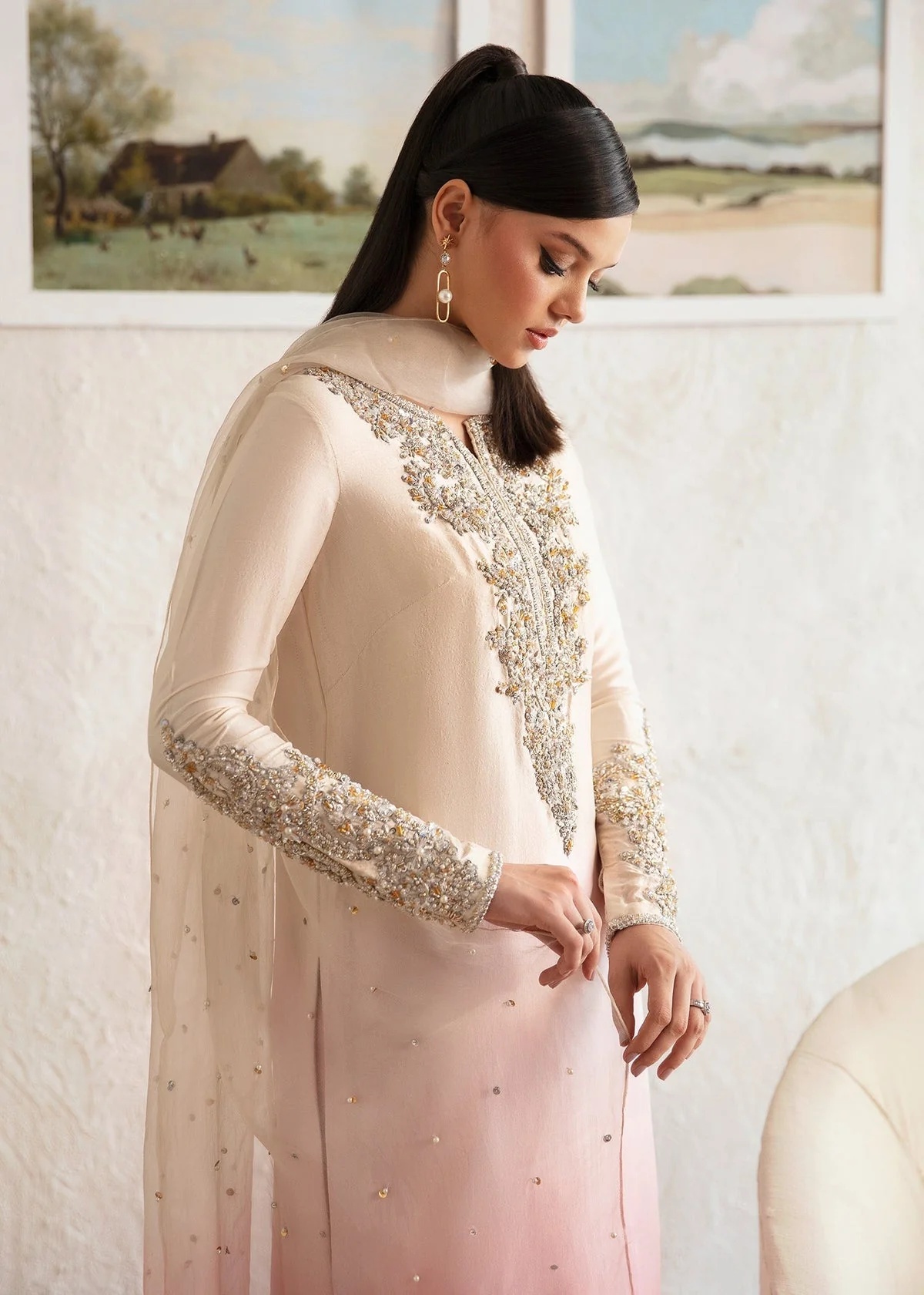 Maura Pakistani fashion outfit in pink tones.