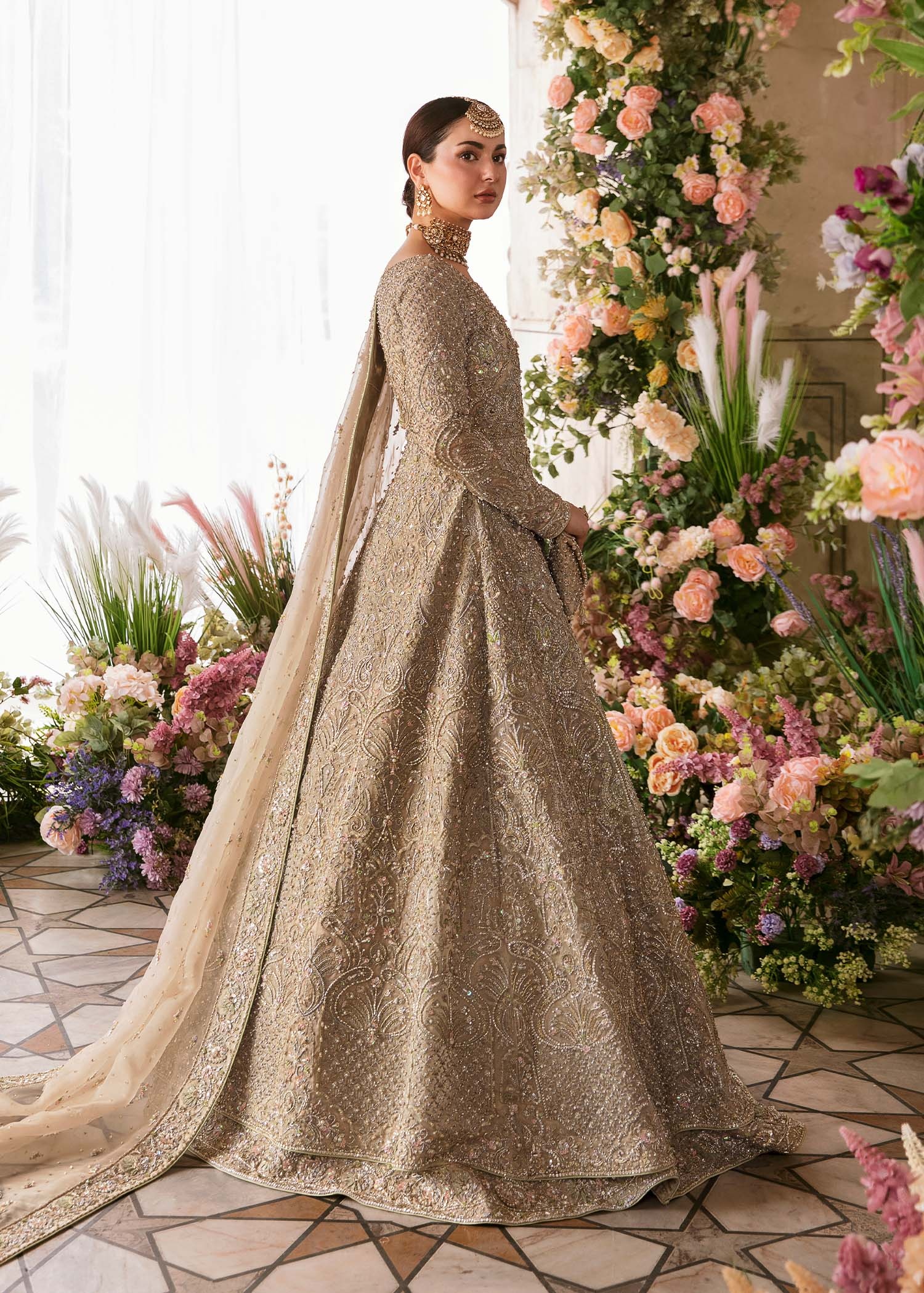 Minha pakistani fashion outfit in beige, gold tones.