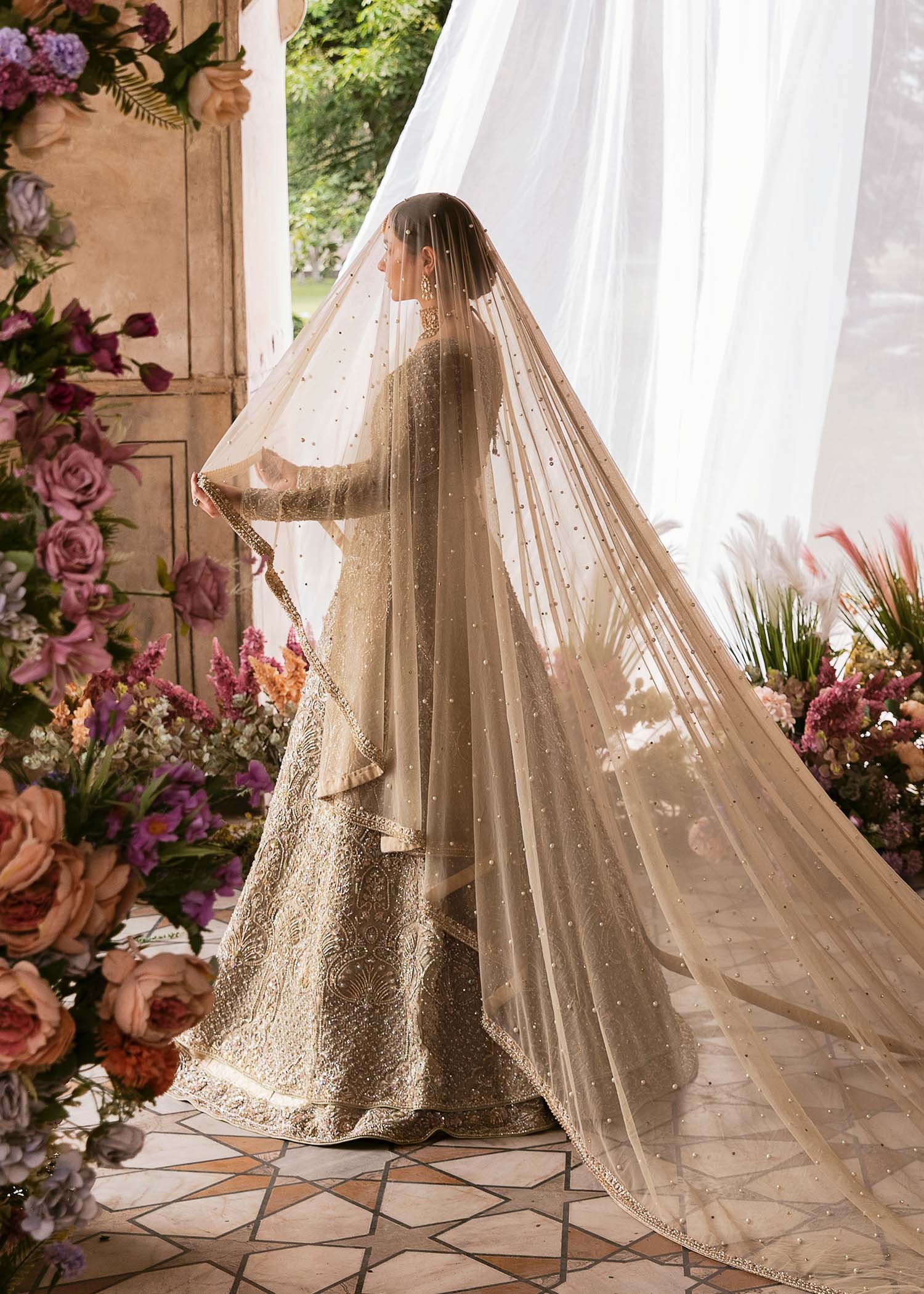 Minha pakistani fashion outfit in beige, gold tones.
