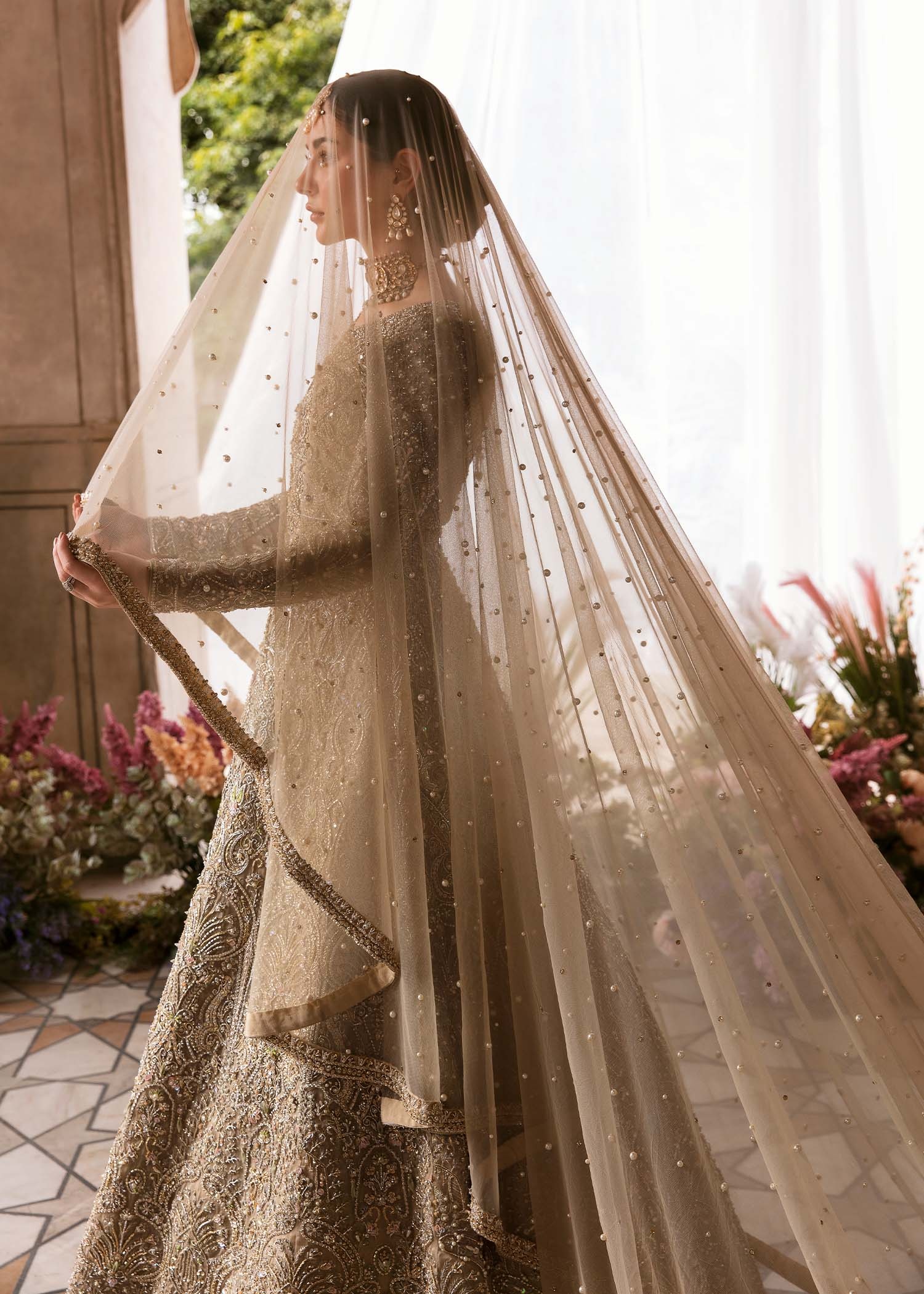 Minha pakistani fashion outfit in beige, gold tones.