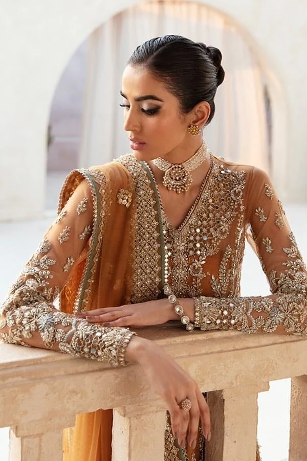 NAIRA pakistani fashion outfit in pink, lilac, rust tones.