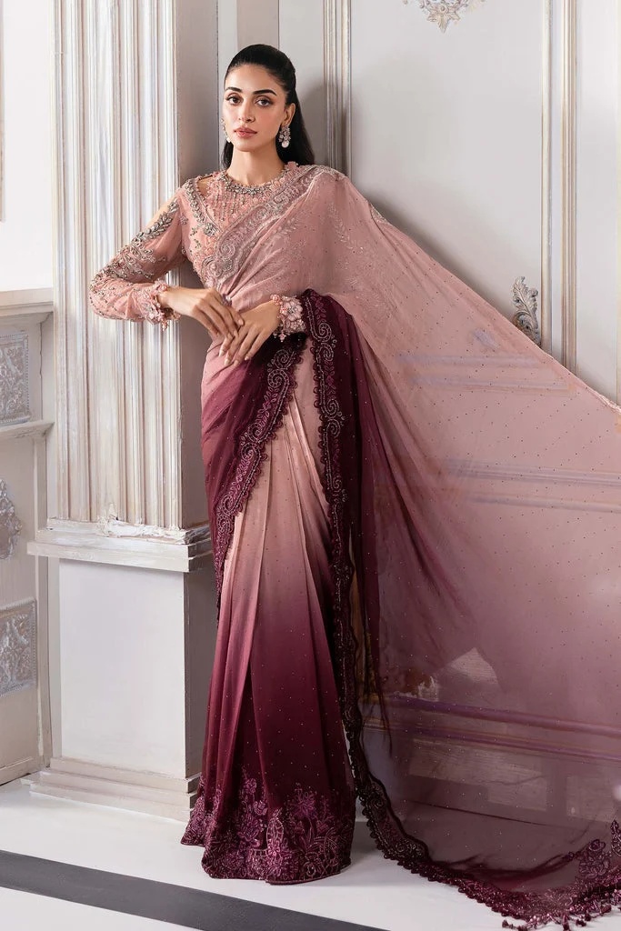Noor pakistani fashion outfit with coordinated formal styling.