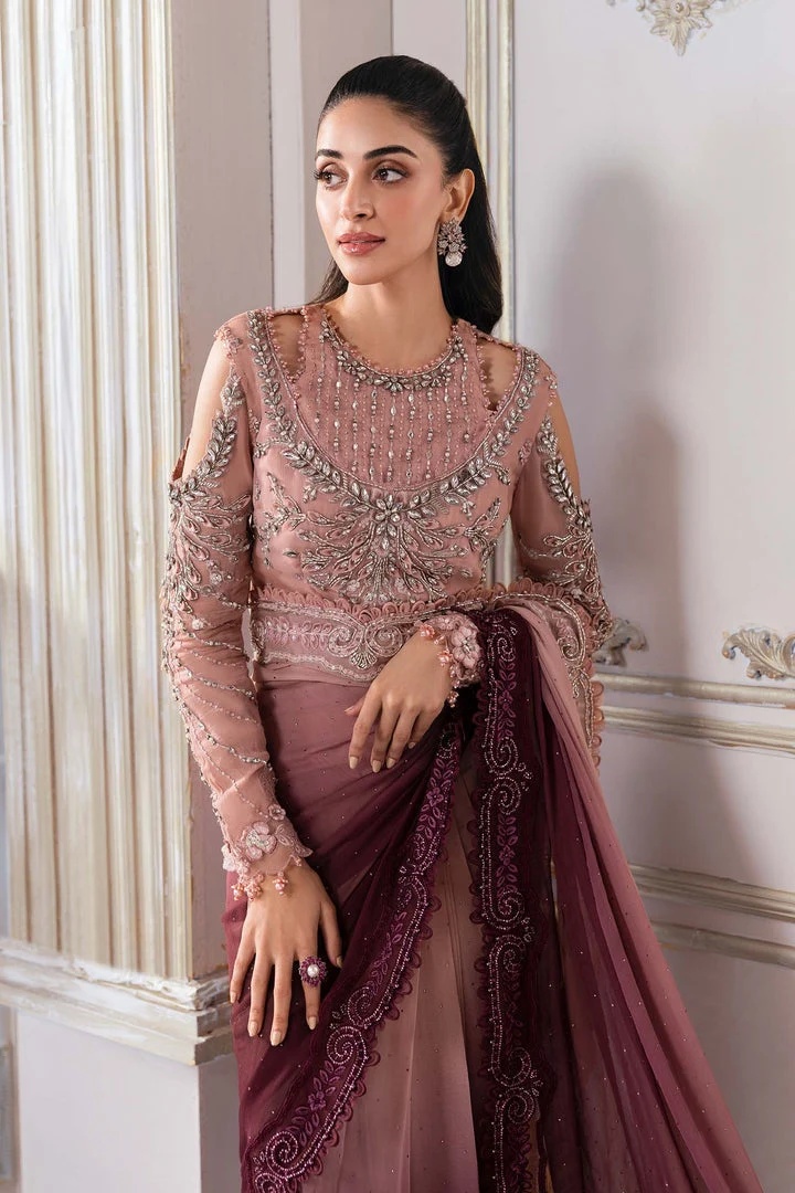 Noor pakistani fashion outfit with coordinated formal styling.