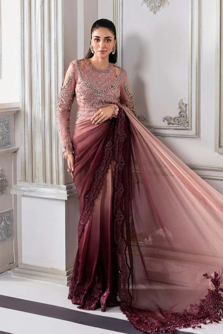 Noor pakistani fashion outfit with coordinated formal styling.