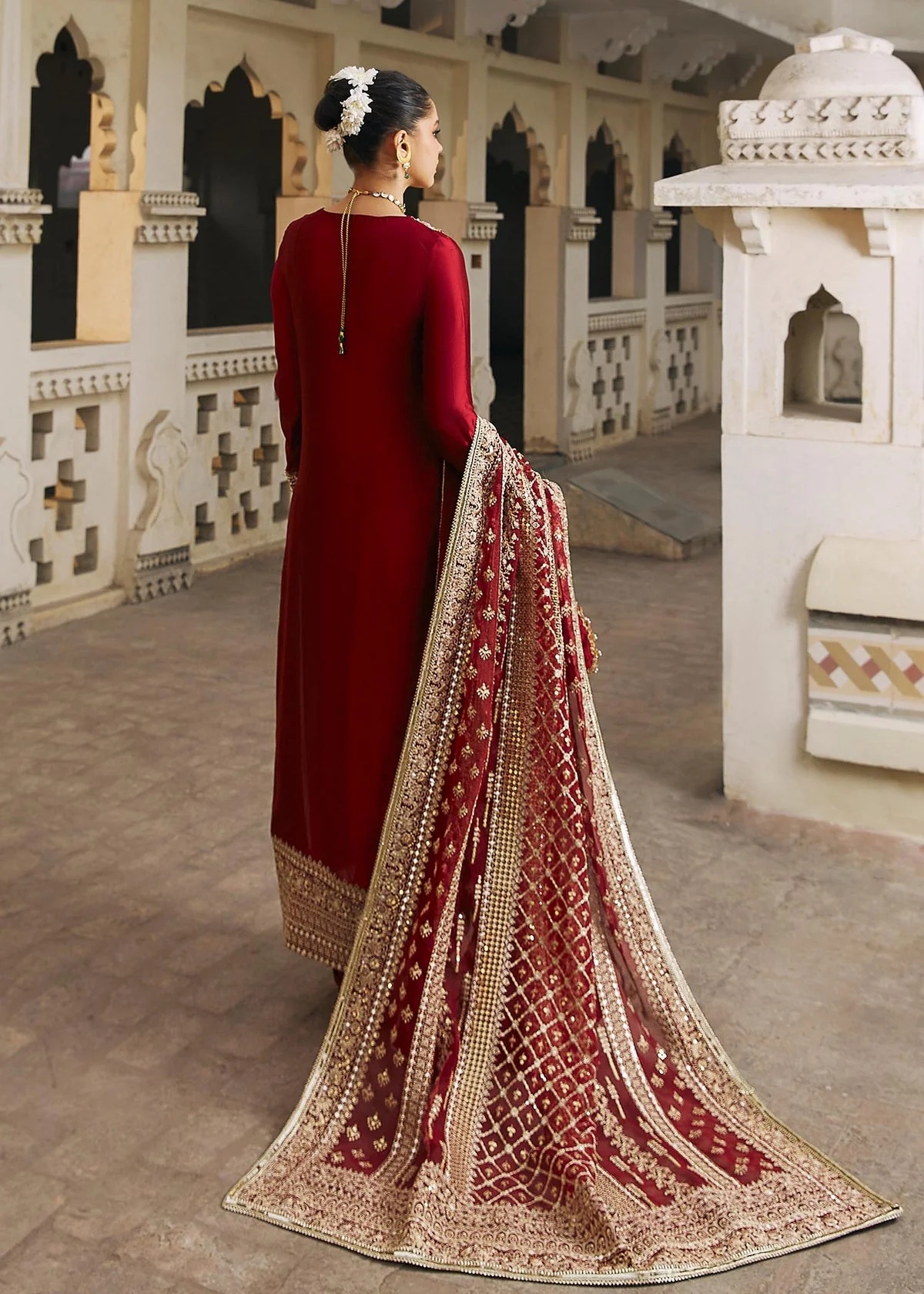 Noreen pakistani fashion outfit in red tones.