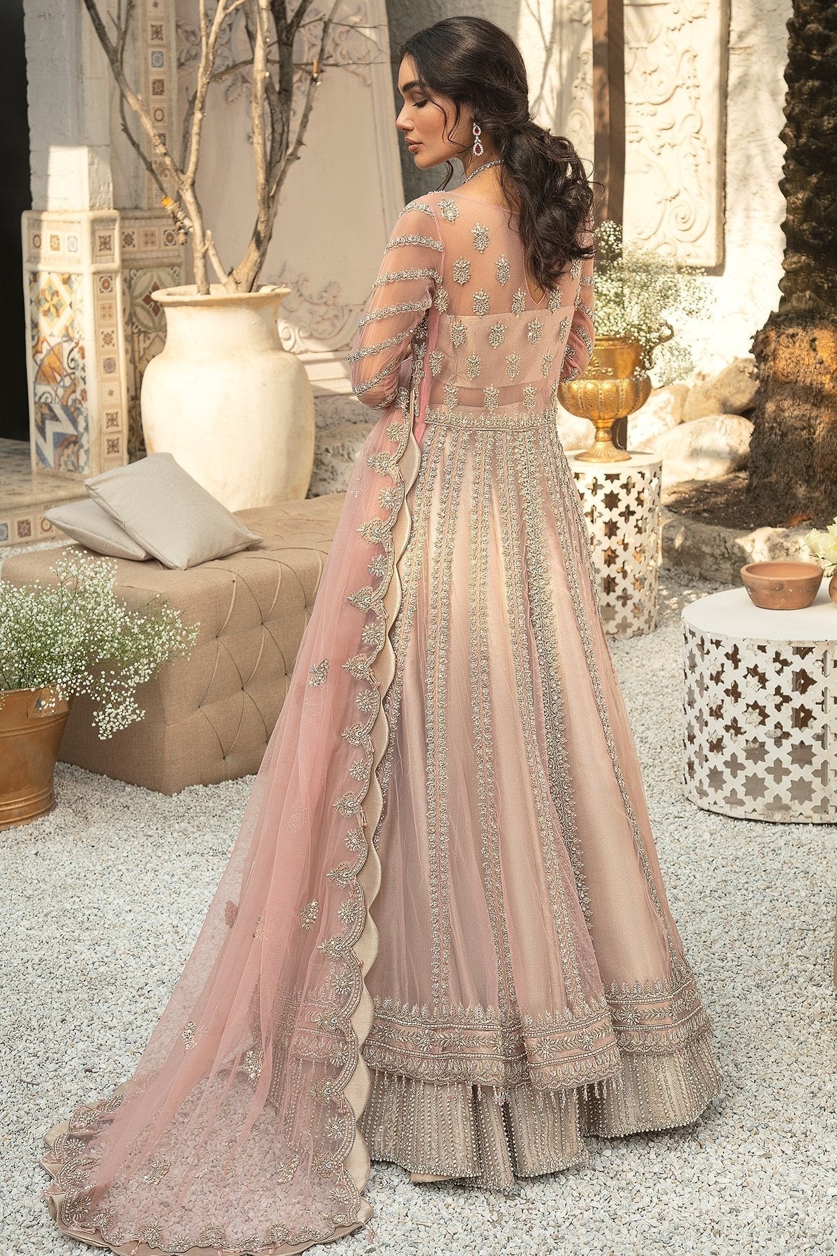 PALATIAL clothing in gold tones.