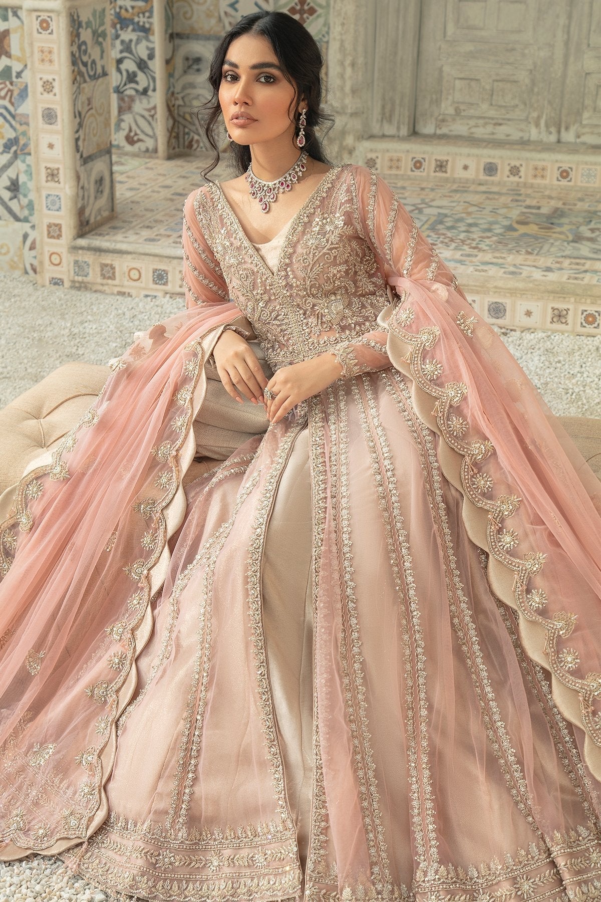 PALATIAL clothing in gold tones.