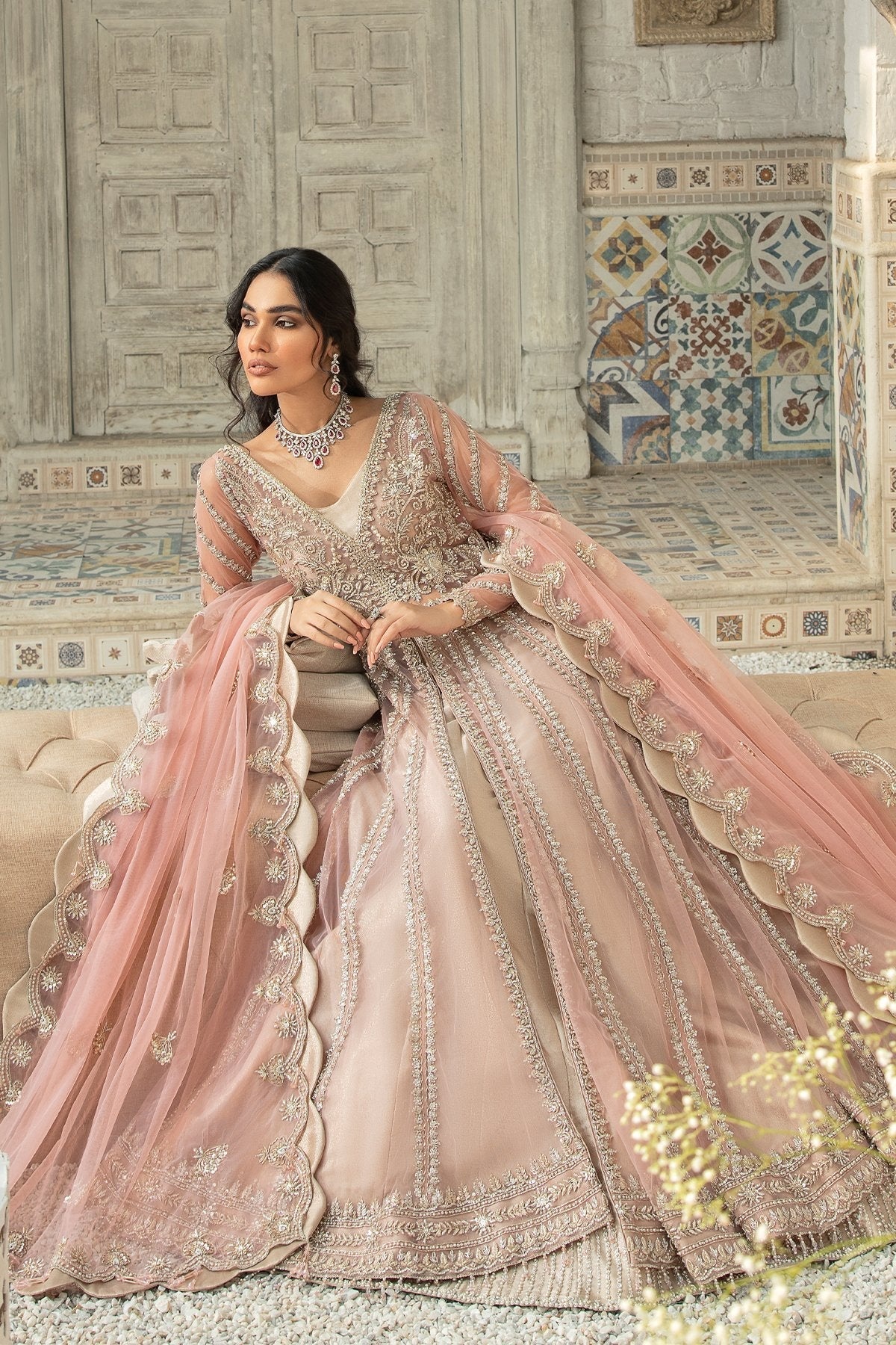 PALATIAL clothing in gold tones.