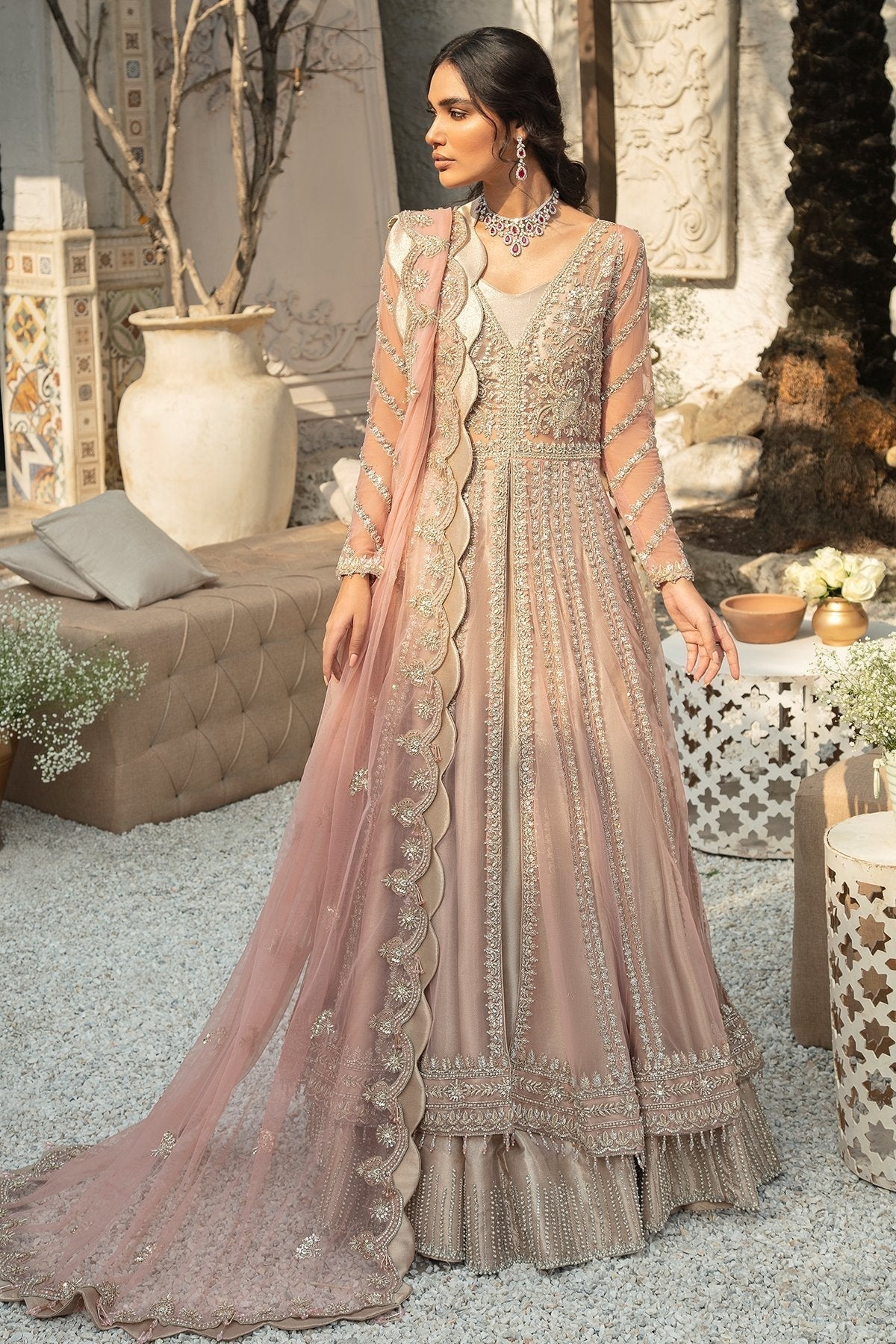 PALATIAL clothing in gold tones.
