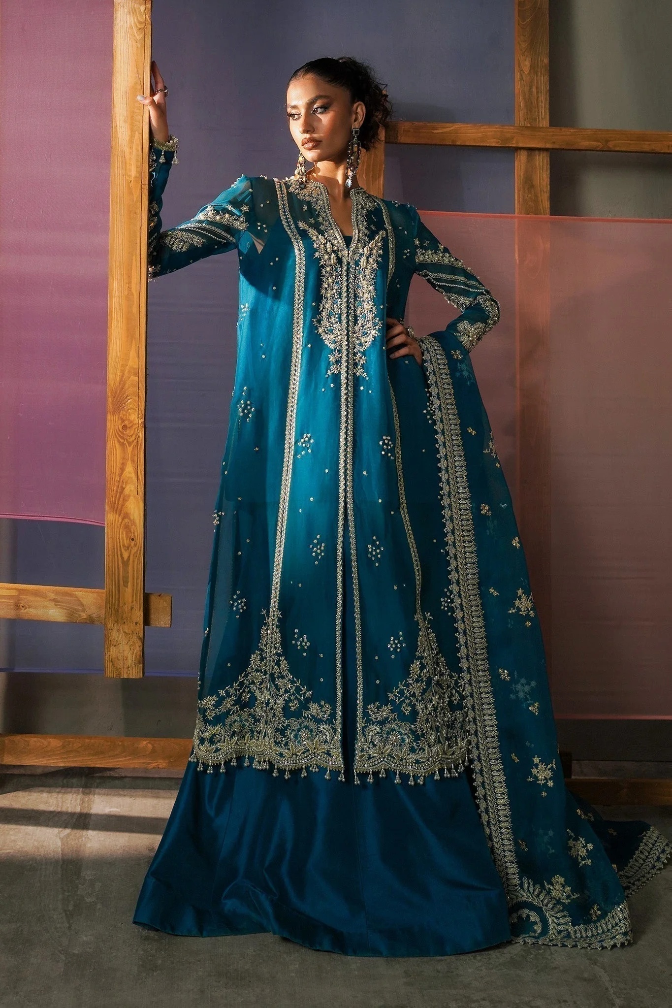 RUMI pakistani fashion outfit in blue, teal tones.