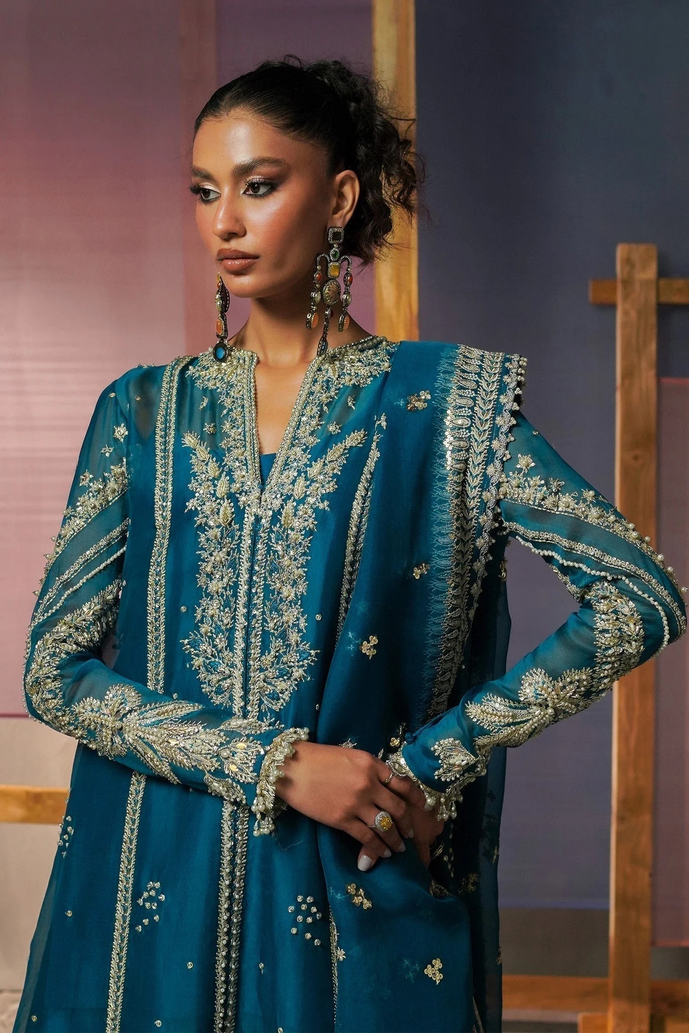 RUMI pakistani fashion outfit in blue, teal tones.