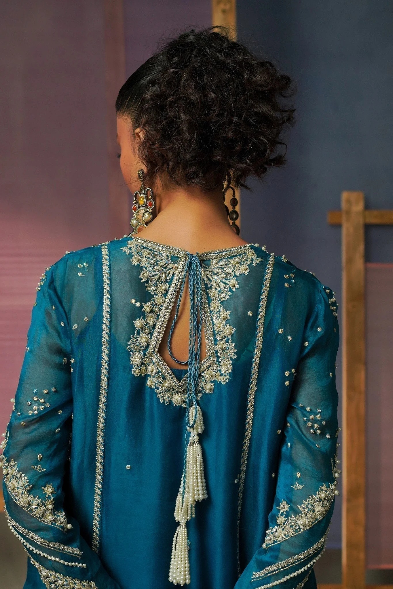 RUMI pakistani fashion outfit in blue, teal tones.