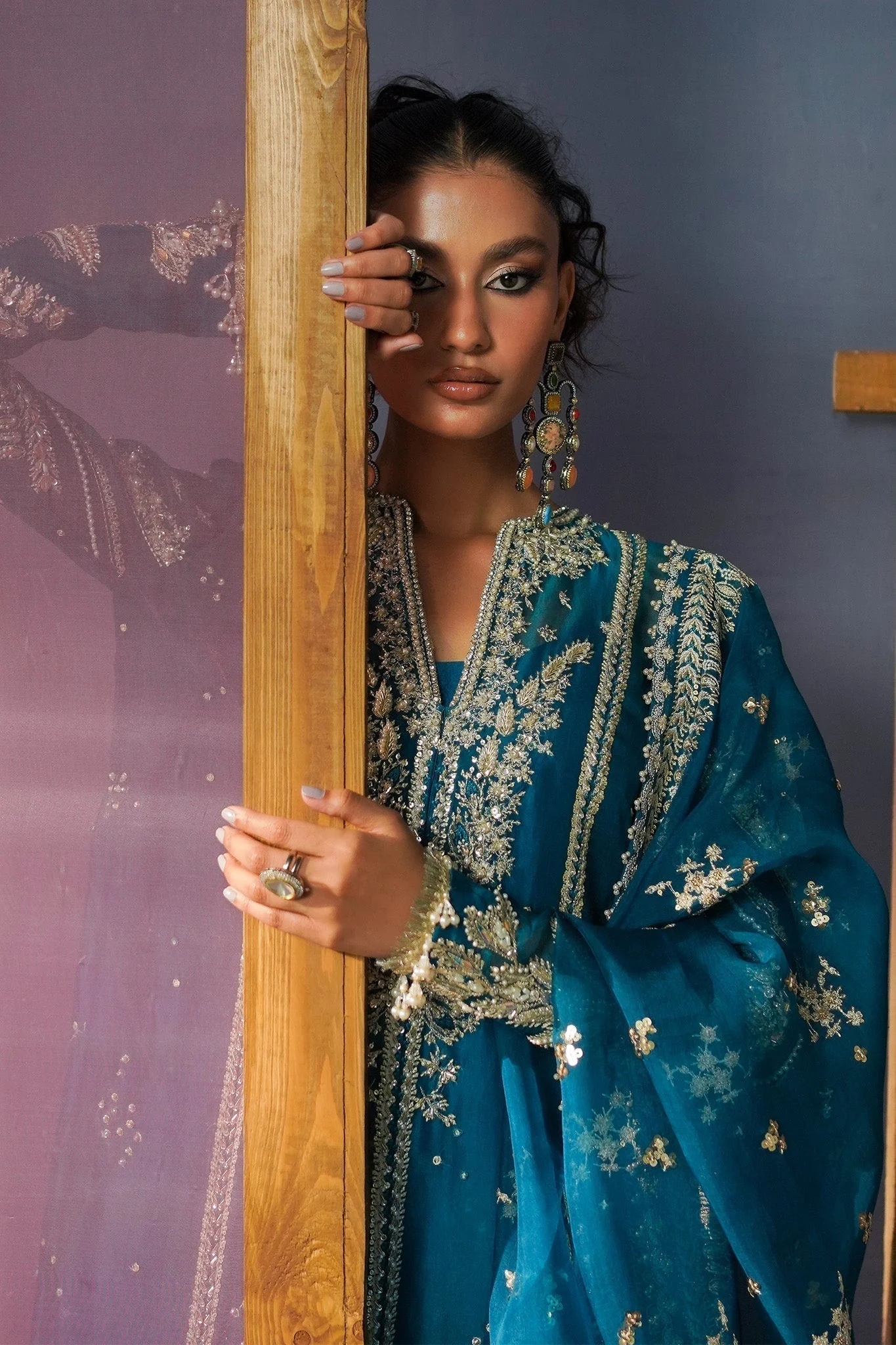 RUMI pakistani fashion outfit in blue, teal tones.