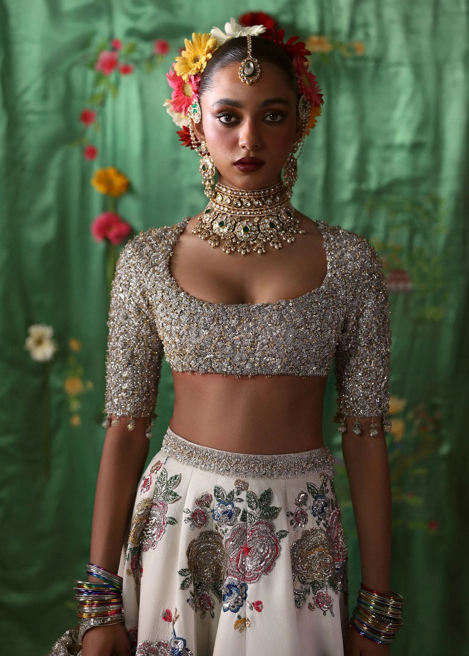 Raks Pakistani fashion outfit in ivory, silver tones.